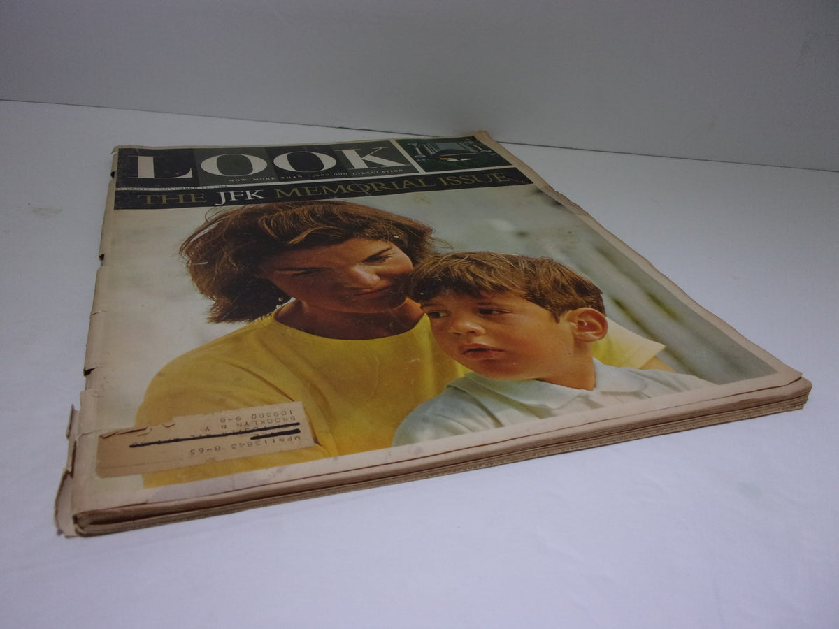 Front cover of Look Magazine: The JFK Memorial Issue, November 17, 1964, featuring a poignant image related to JFK, showcasing the magazine's vintage aesthetic and collectibility.