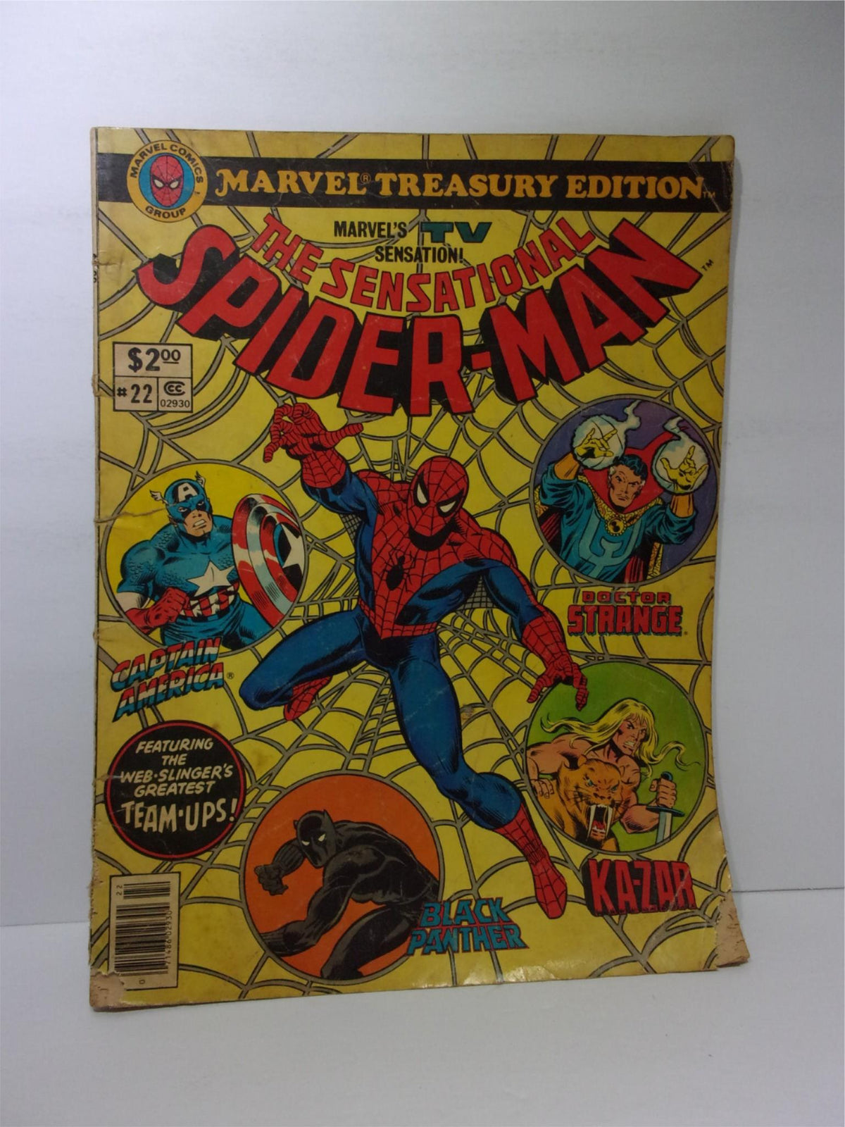 Cover of Marvel Treasury Edition The Sensational Spider-Man #22 featuring Spider-Man in action, surrounded by iconic characters like Captain America and Doctor Strange, showcasing vintage comic art from the late 1970s.
