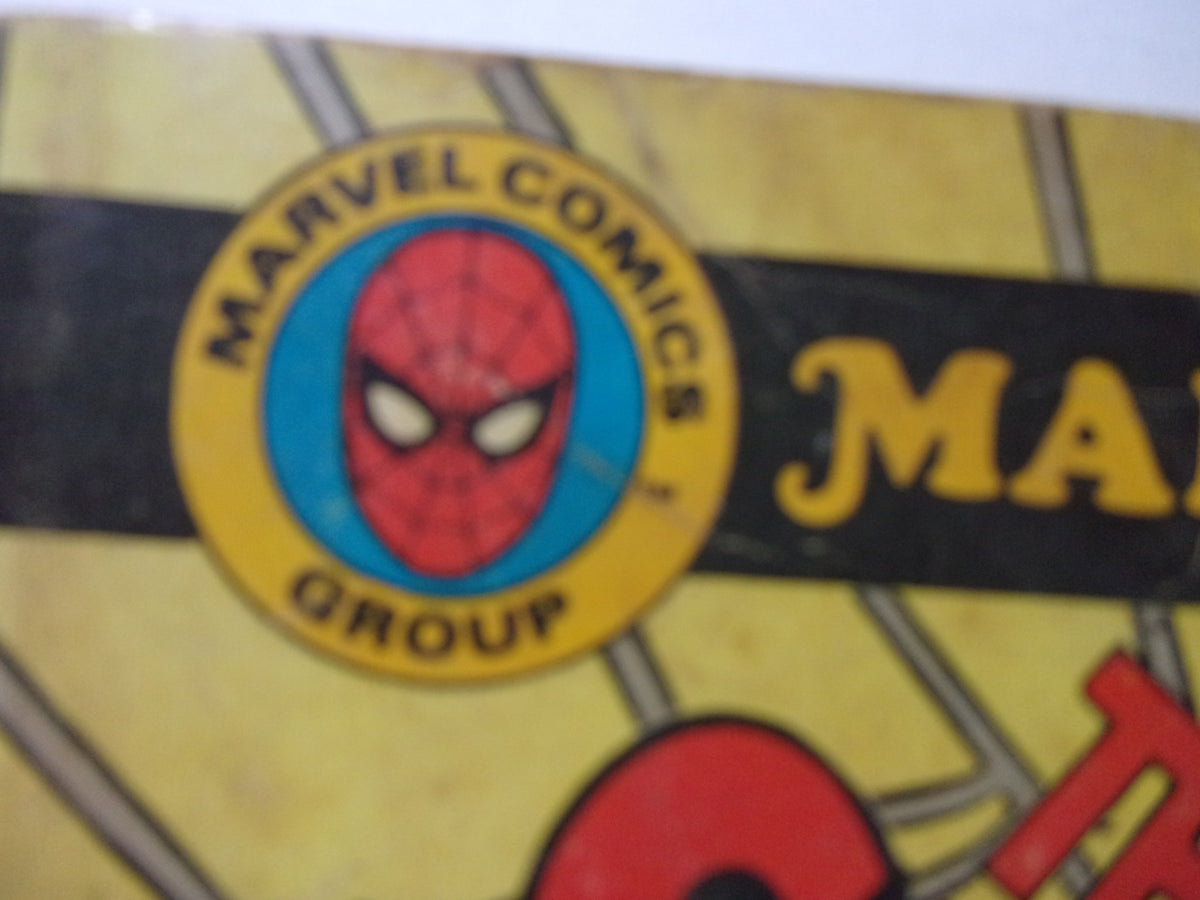Close-up of the Marvel Comics Group logo on the cover of Marvel Treasury Edition The Sensational Spider-Man #22, capturing the classic spider emblem associated with Spider-Man.