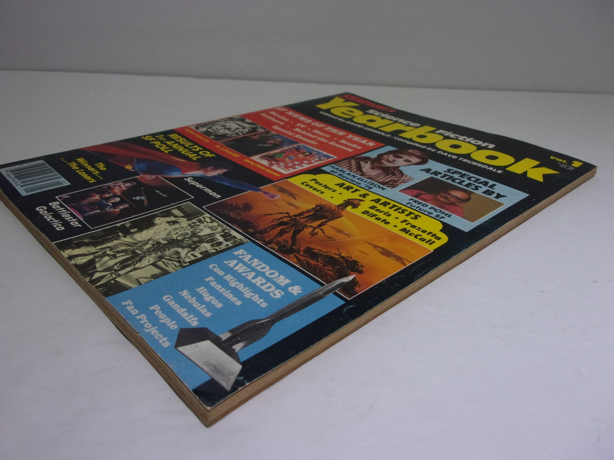 Back view of Starlogs Science Fiction Yearbook Vol. 1, highlighting advertisements and content related to science fiction and fandom.