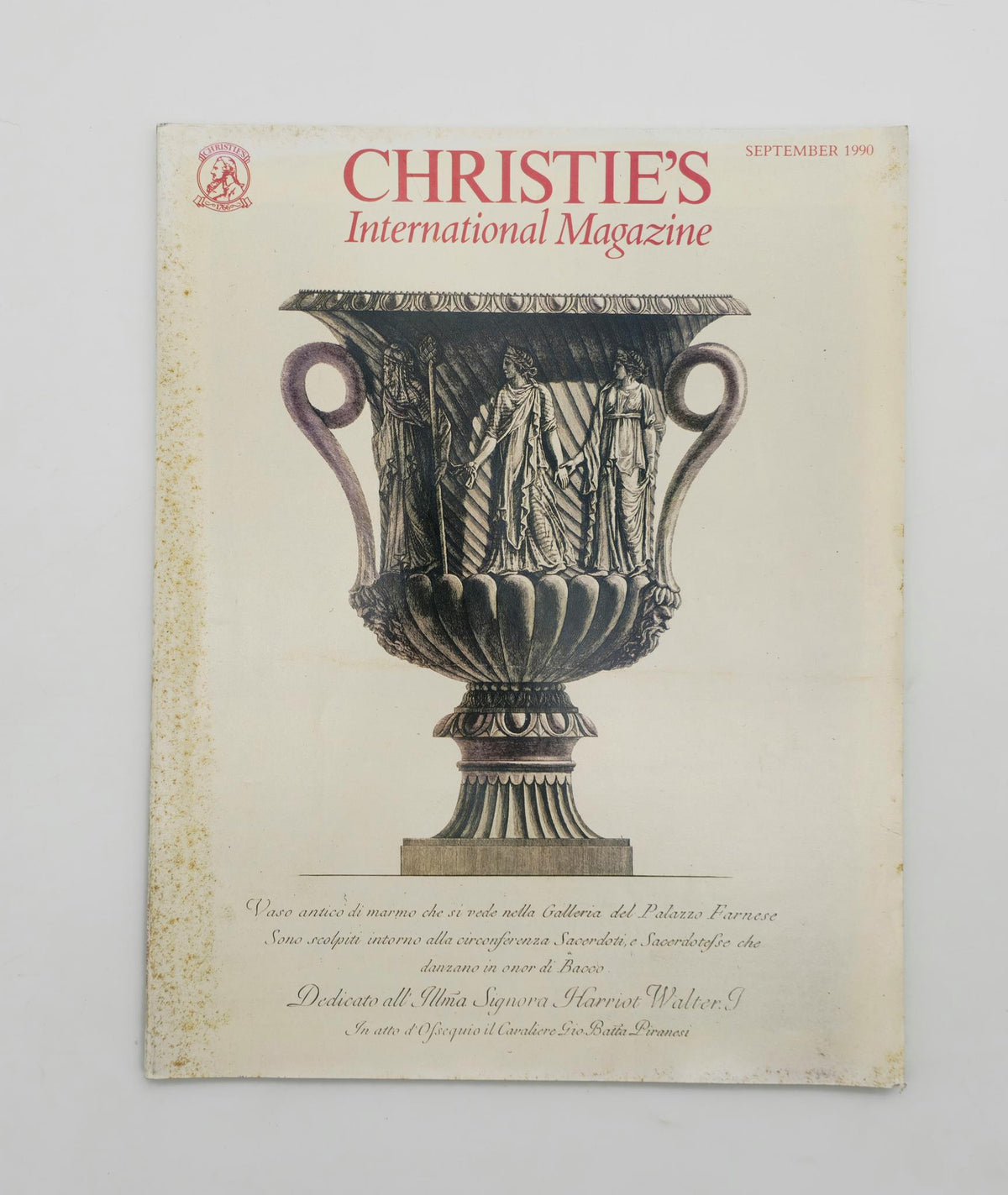 Cover of Christie's International Magazine September 1990 featuring an ancient marble vase design, highlighting the issue's theme 'The Whole Country Red'.