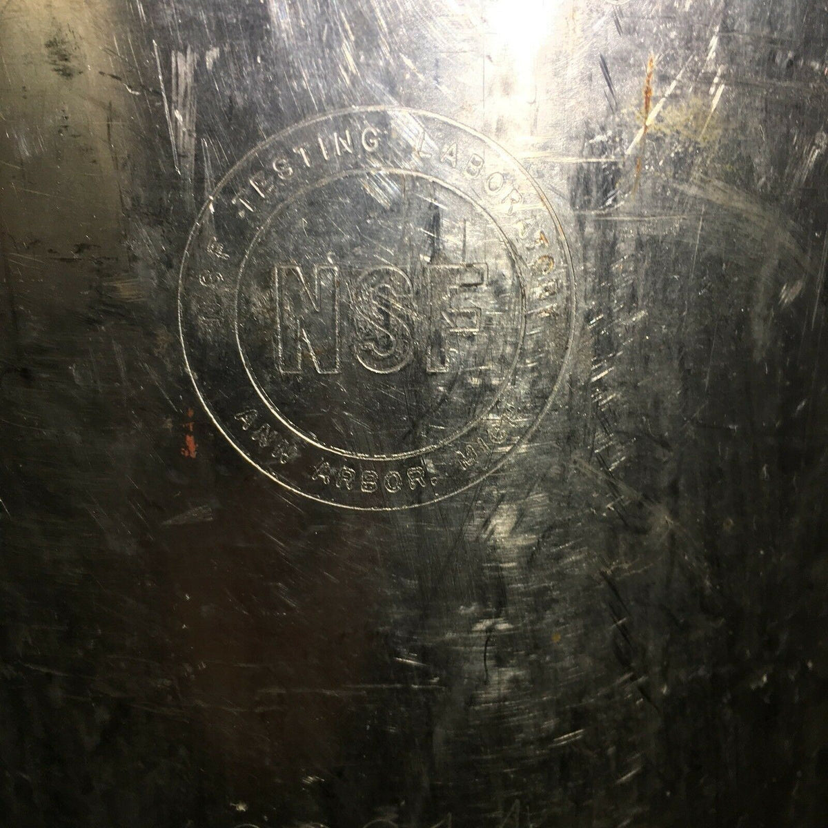 Detail of the NSF marking on the Vintage COCA COLA Keg Syrup 5 Gallon, significant for historical beverage enthusiasts.