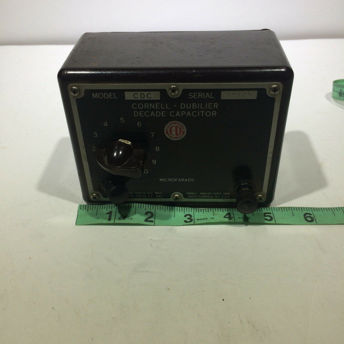 Front view of the Cornell Dubilier Decade Capacitor Model CDC3 SN 19124 featuring a control knob and indicating microfarads, ideal for electronic experiments.