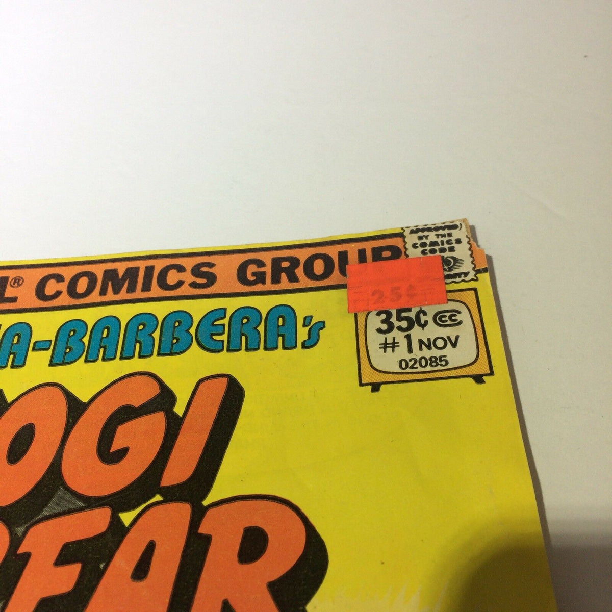 Close-up of the price sticker on Marvel Comics YOGI BEAR #1, showing the comic's price of 35 cents and publication date of November.