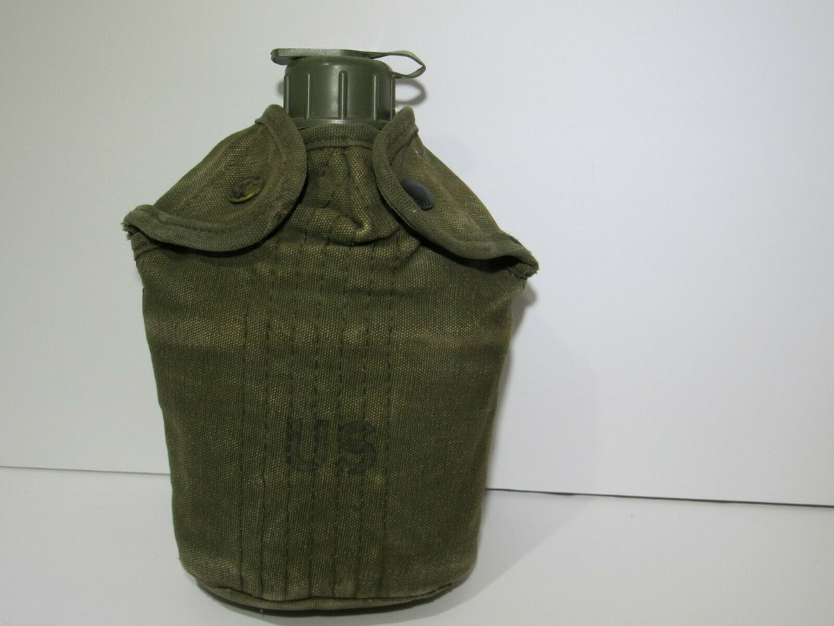 US Military Issue Vietnam Style War Era Canteen with Nylon Cover - front view showing its authentic design and green fabric.