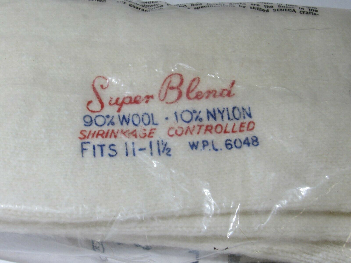Close-up of the label from Vintage New Old Stock Seneca Red Jacket Athletic Socks, showing composition of 90% wool and 10% nylon, fitting men's shoe sizes 11-11 1/2.