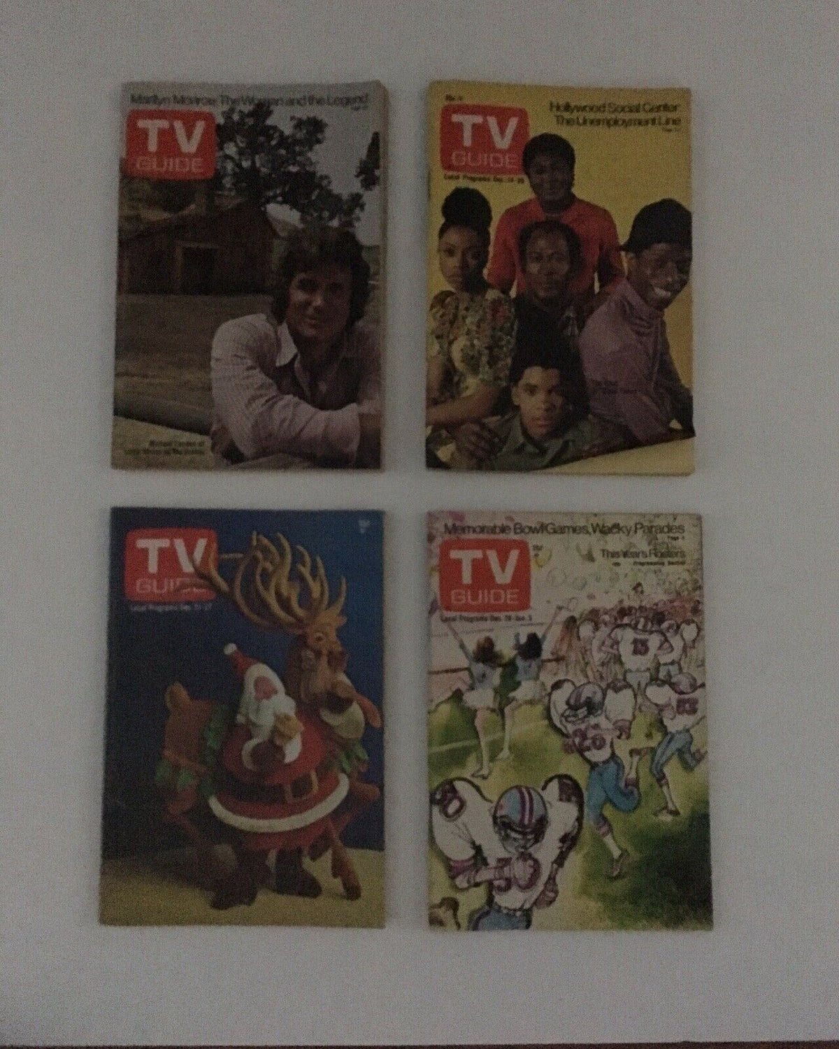 Complete Year Of TV Guide Magazines 1974 featuring four different magazine covers, showcasing a mix of iconic TV moments and themes including a Christmas special and sports parades.