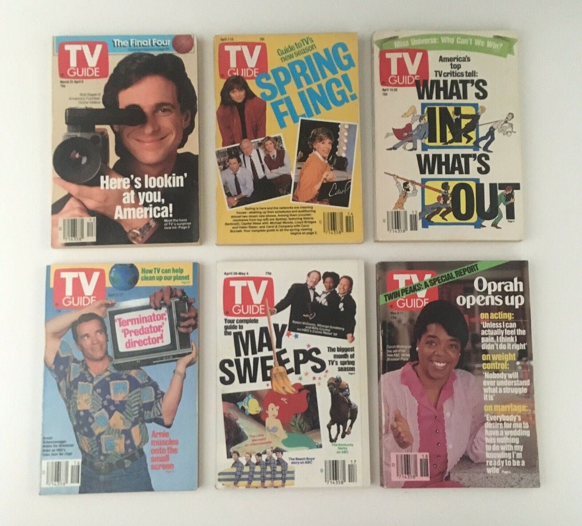 Collection of TV Guide magazines from 1990, showcasing covers such as Spring Fling, What's In and What's Out, and May Sweeps, offering insights into popular TV trends of the time.