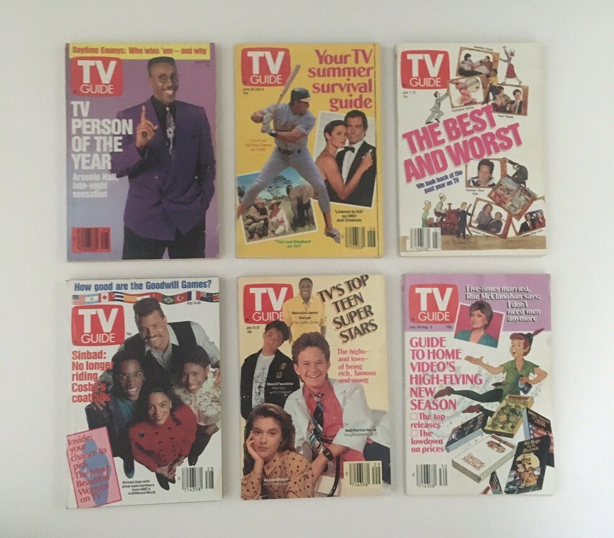 Selection of TV Guide magazines from 1990, with covers mentioning TV Person of the Year and television holiday guides, emphasizing notable figures and events in the television industry.