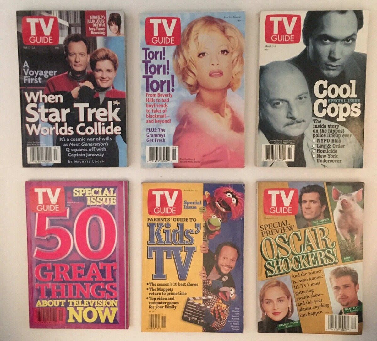 Collection of TV Guide magazines from 1996, featuring covers of Star Trek, Tori Spelling, and Cool Cops, highlighting pop culture and television previews for Fall.