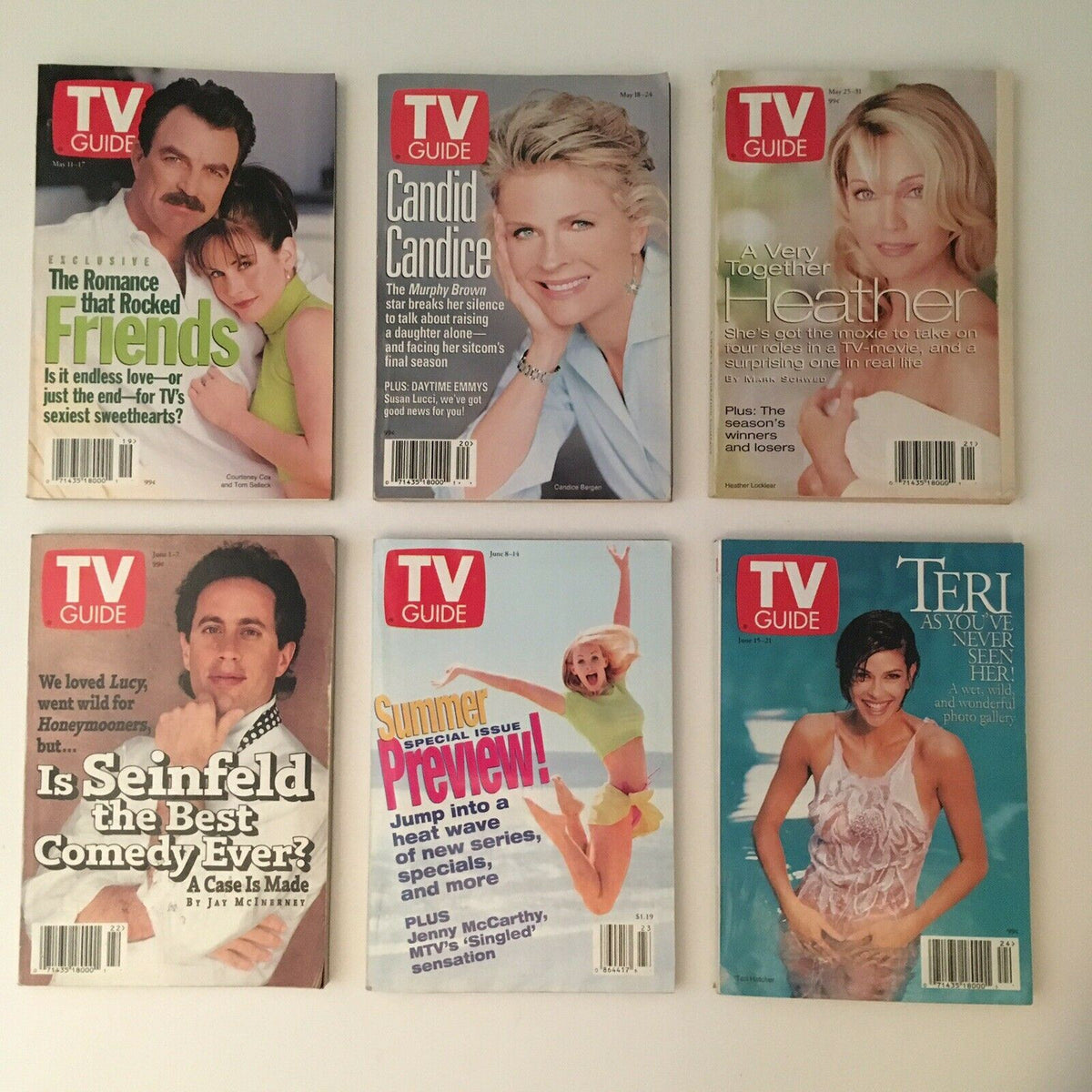 Display of TV Guide magazines from 1996, featuring covers highlighting Friends, Candid Candice, and a special preview of Teri Hatcher, reflecting on notable television moments.