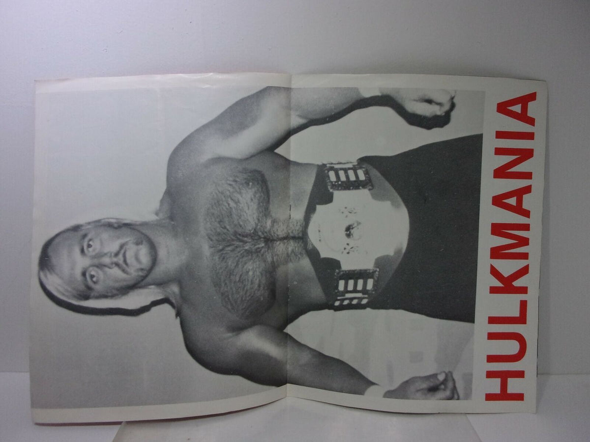 Inside view of the Special Tribute Hulk Hogan Magazine: Hulk - A - Mania Running Wild!, featuring Hulk Hogan posing with a championship belt, emphasizing his wrestling persona.