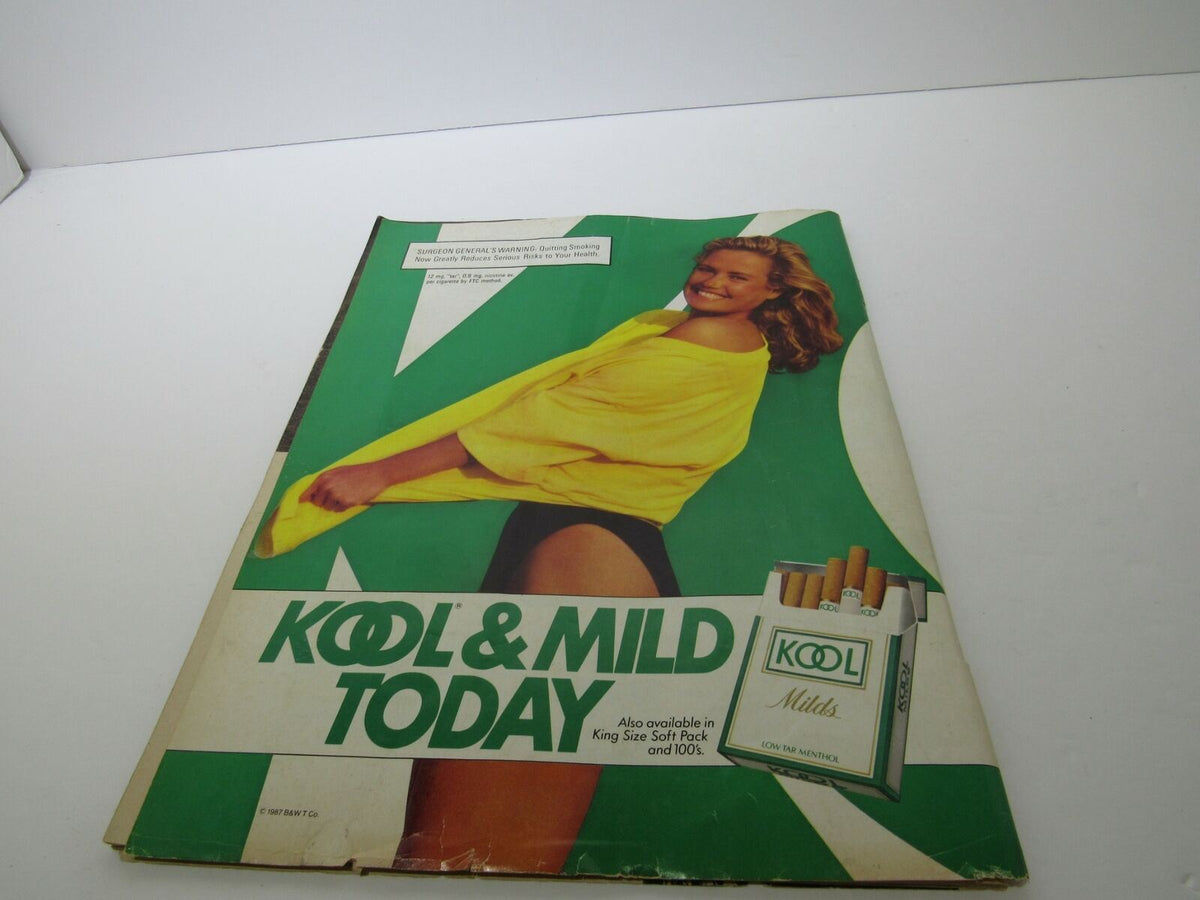Advertisement page from Sports Illustrated February 1 1988, displaying a model promoting Kool & Mild cigarettes, emphasizing the retro design and vibrant colors.