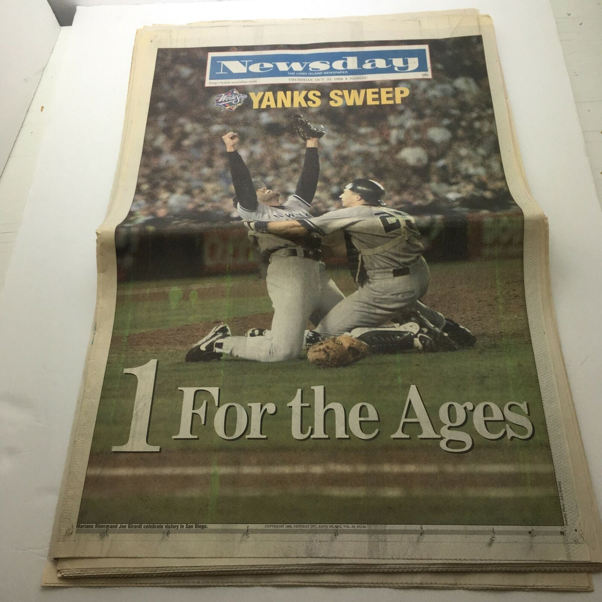 Front page of Newsday featuring the headline 'Yanks Sweep 1 For the Ages' celebrating the New York Yankees' victory.