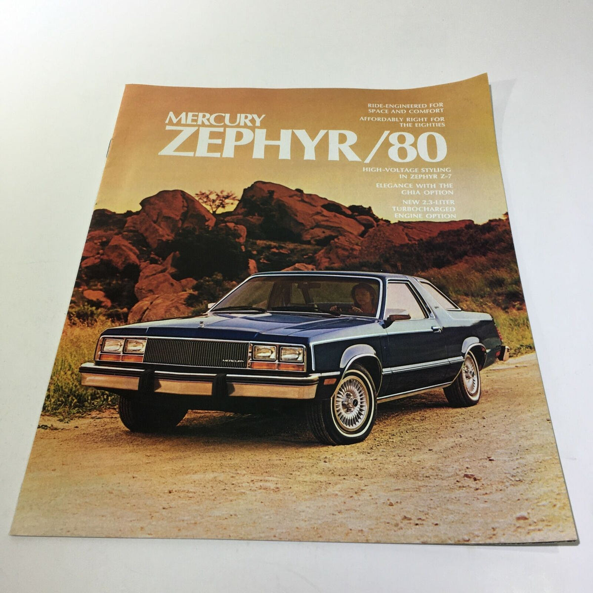 1980 Mercury Zephyr Z-7 Turbo Charged Engine Option Car Sale Brochure showcasing the Mercury Zephyr parked on rocky terrain with a scenic background.