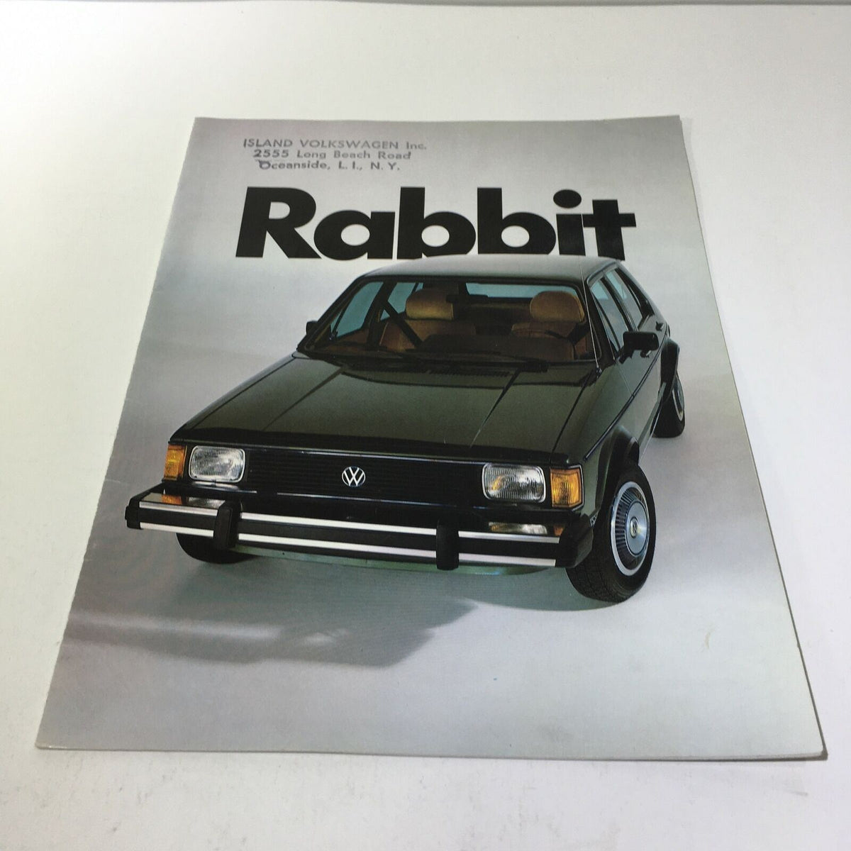 1982 Island Volkswagen Rabbit Fuel-Injected Engine 74 Horsepower Car Brochure featuring a black Volkswagen Rabbit model on the cover.