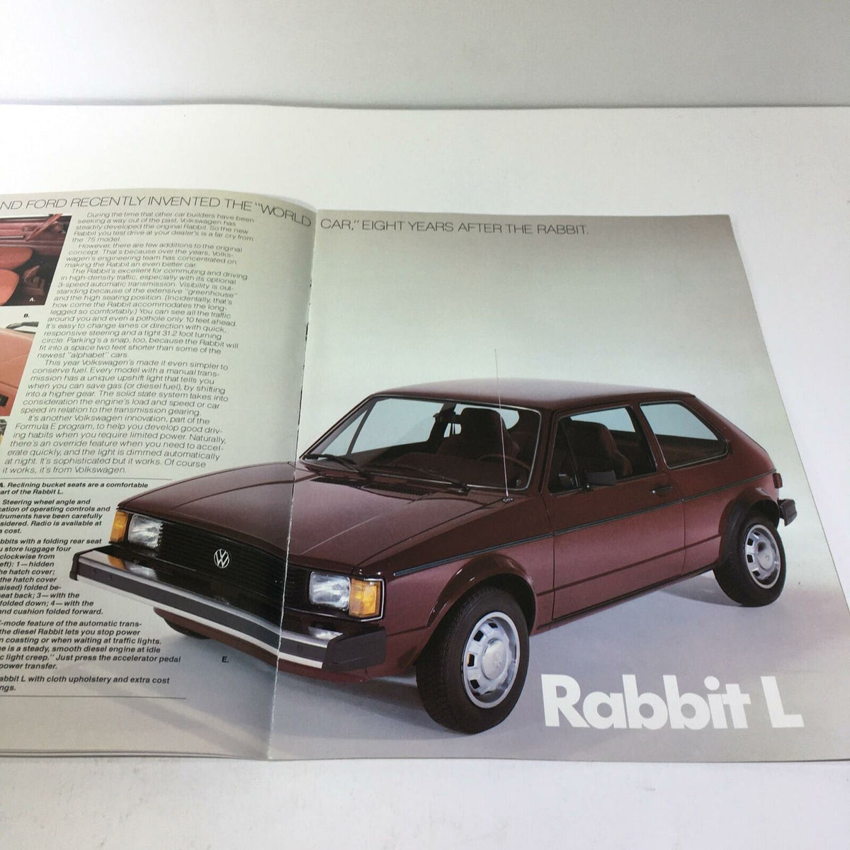 1982 Island Volkswagen Rabbit Fuel-Injected Engine 74 Horsepower Car Brochure highlighting a maroon Volkswagen Rabbit L model.