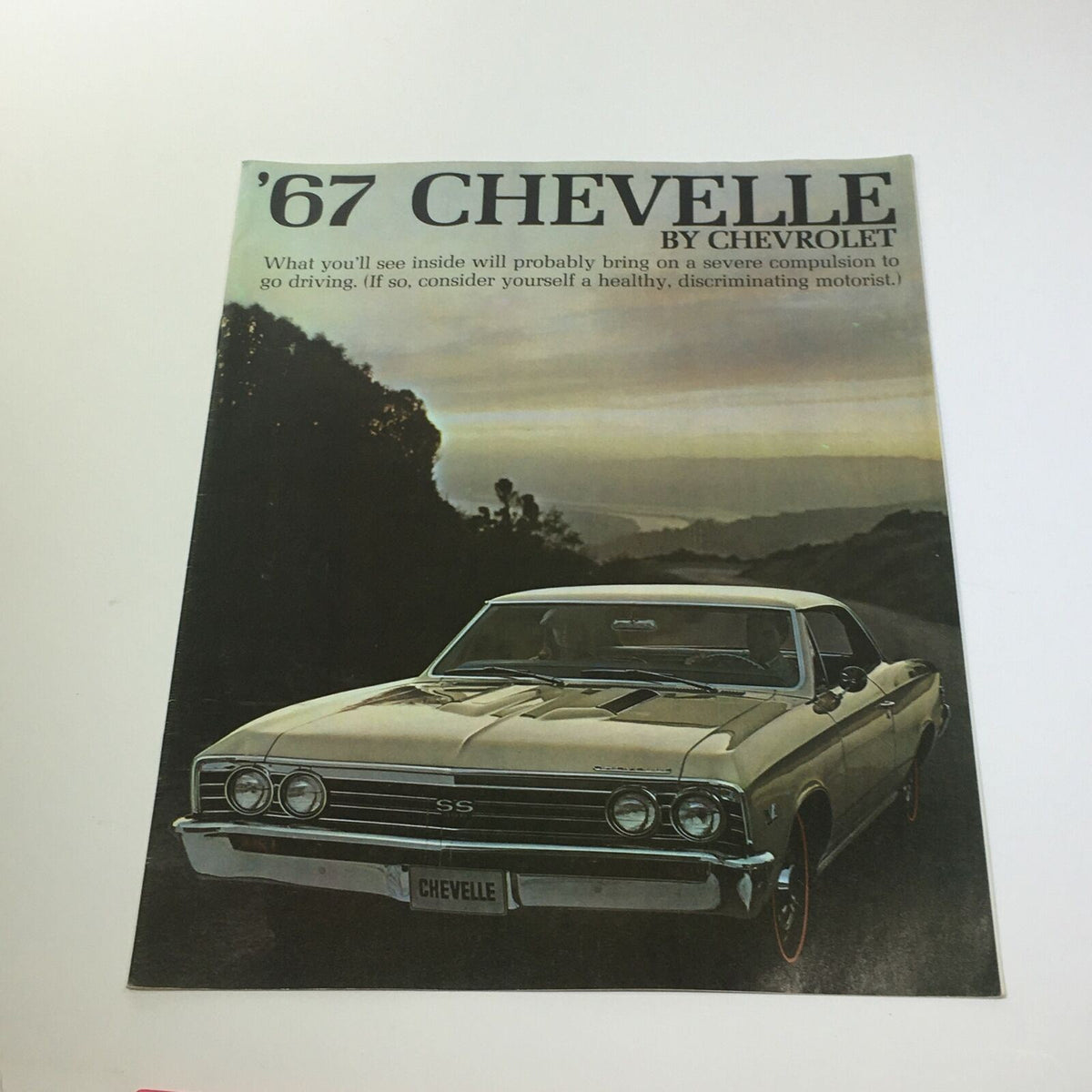 1967 Chevelle by Chevrolet SS 396 Car Catalog cover featuring a classic Chevelle on a scenic background.