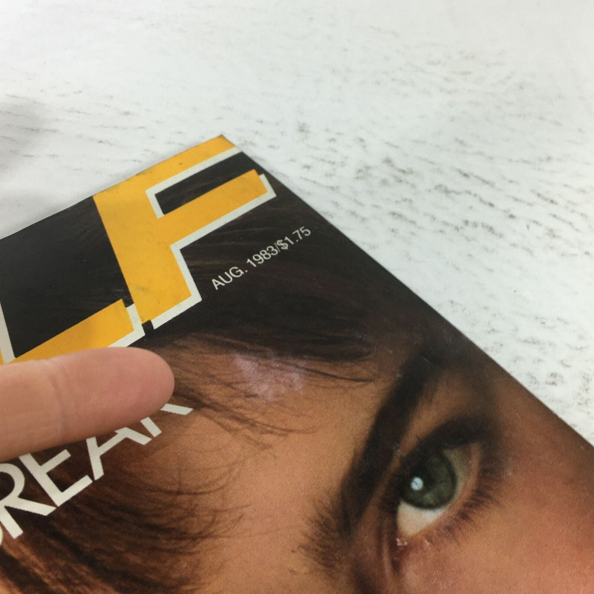 Close-up view of VTG Self Magazine August 1983 cover highlighting publication date and price, with a focus on Brooke Shields’ eye and hairstyle.