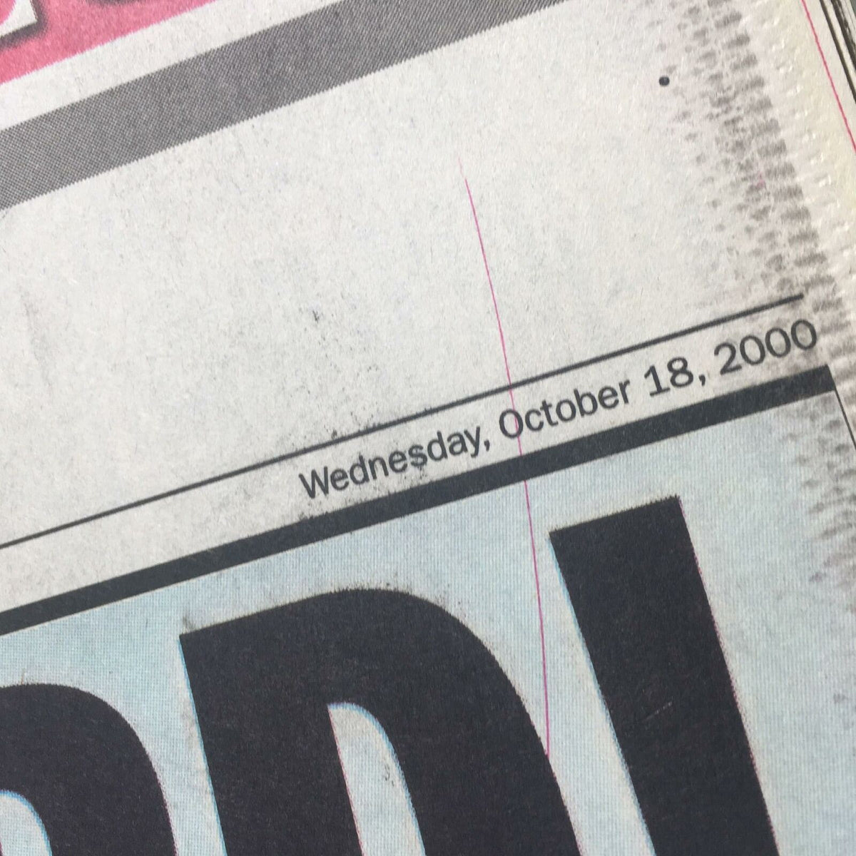Date stamp on the NY Daily News: Oct 18 2000 All Aboard! identifying the publication date as Wednesday, October 18, 2000.