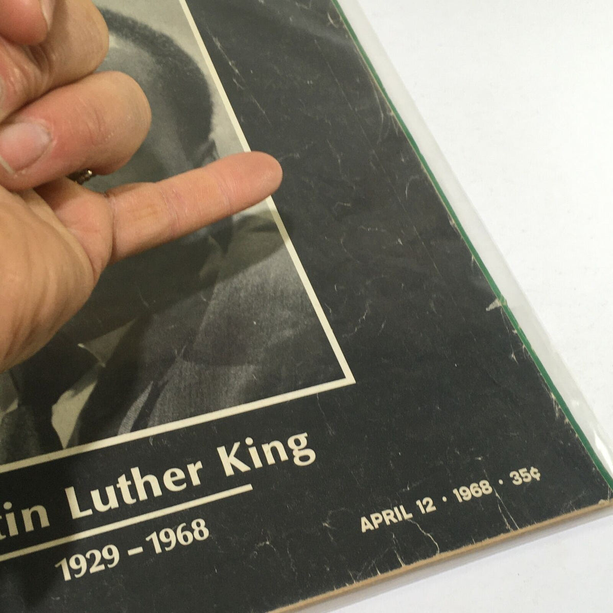Detail of the vintage Life Magazine showing the name 'Martin Luther King' with dates from April 12, 1968, linked to the civil rights leader.