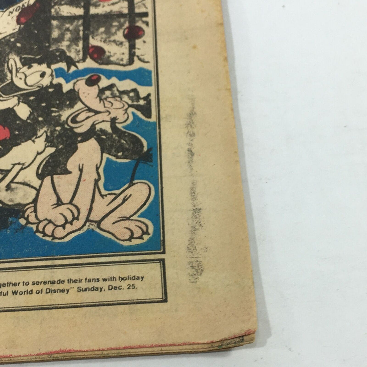 Vintage TV Dial Complete Cable Listings for December 24-31, 1977 featuring Mickey Mouse and Donald Duck, showcasing colorful artwork and nostalgic graphics.