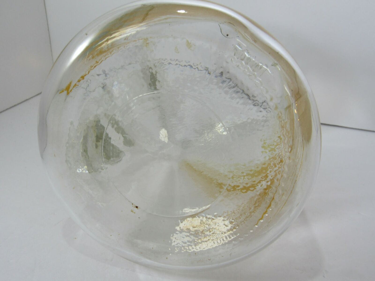 Bottom inside view of Vintage Libbey Golden Wheat Glass Pitcher with Ice Lip, showing the glass texture and craftsmanship.