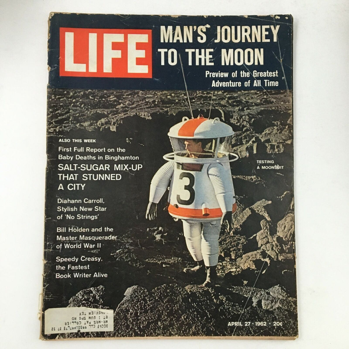 Cover of Life Magazine from April 27, 1962, featuring the title 'Man's Journey To The Moon' with an astronaut in a moon suit testing equipment on a lunar-like surface.