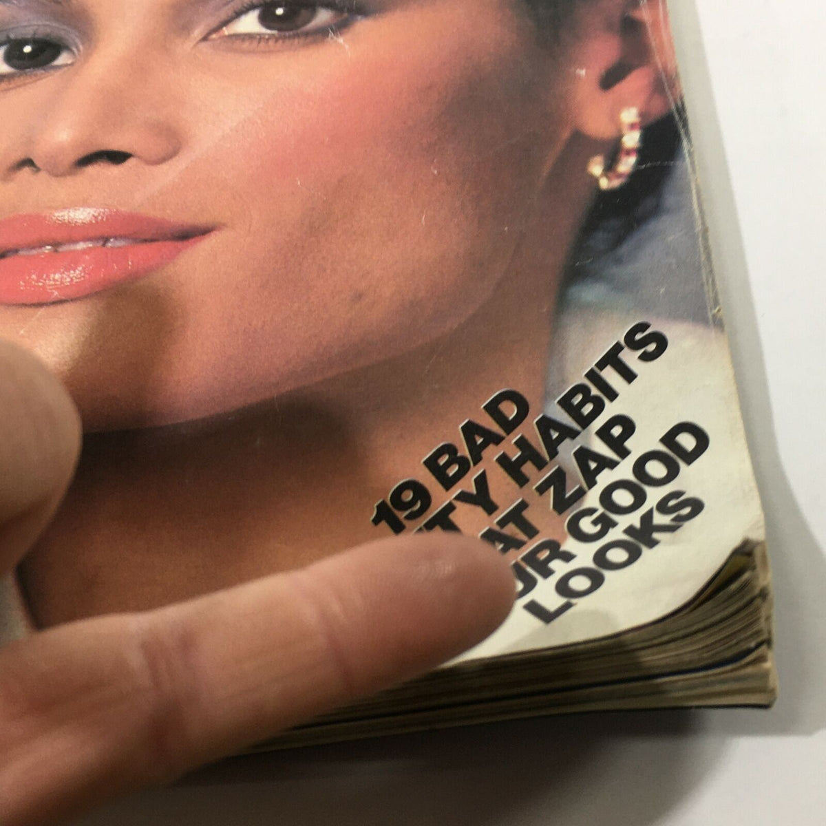 Close-up of the 'Glamour' magazine cover from November highlighting the text '19 Bad Beauty Habits That Zap Your Good Looks', related to the VTG Mademoiselle Magazine: November 1982 - Beverly Johnson Beautiful Cover.