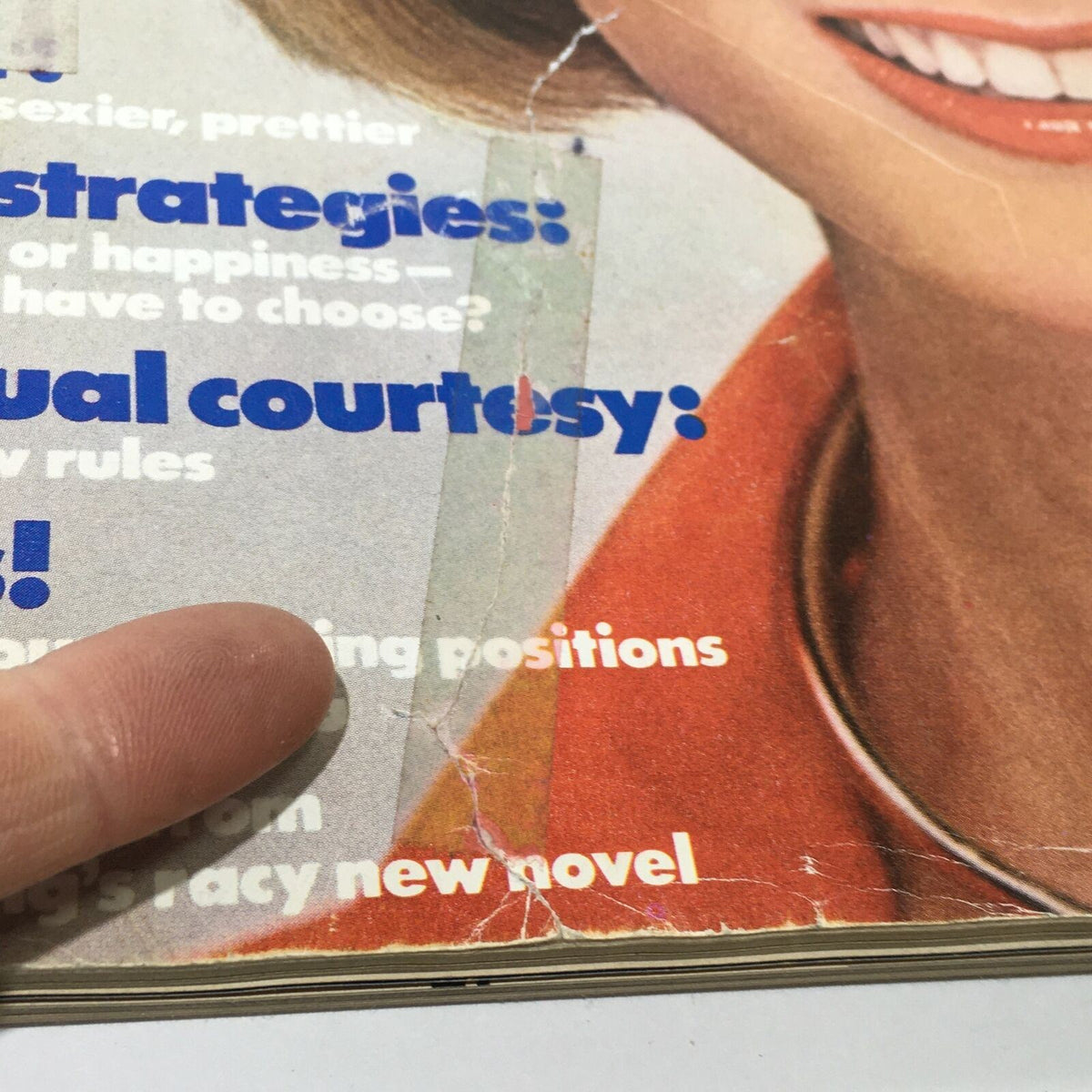 Detailed view of the VTG Mademoiselle Magazine: March 1977 cover with highlighted text on job strategies and sexual courtesy. Showcasing the vintage charm and style of the late 1970s.