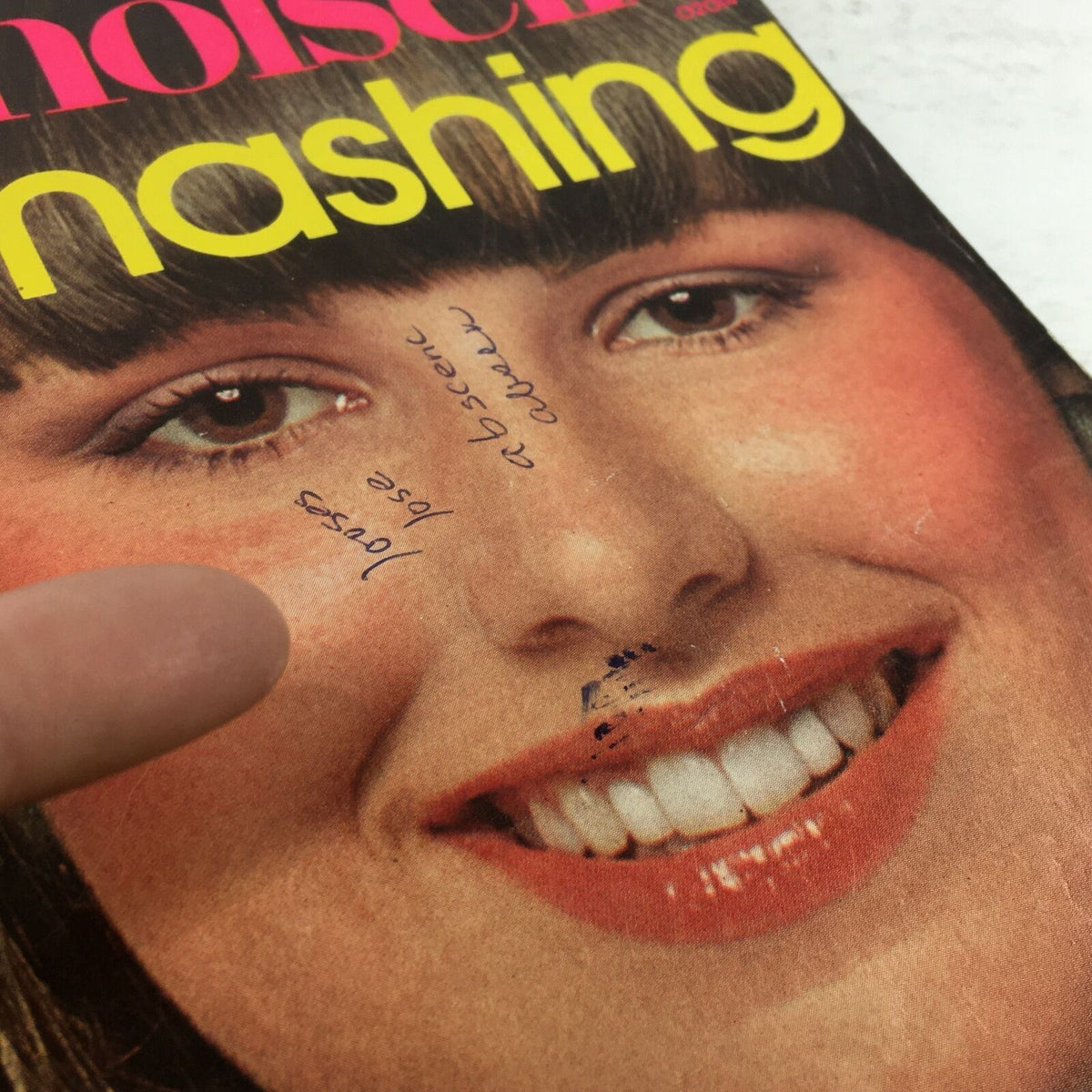 Close-up of the VTG Mademoiselle Magazine November 1975 cover, highlighting the smiling woman's face and handwritten notes, reflecting the magazine's character.