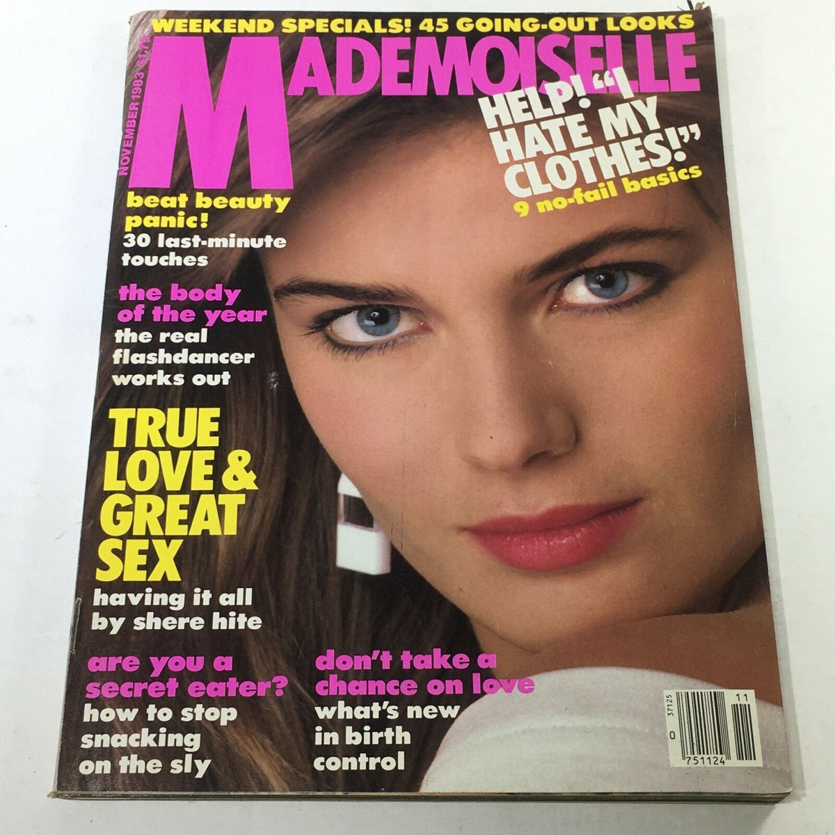 November 1983 Mademoiselle Magazine cover featuring supermodel Paulina Porizkova, showcasing striking makeup and large earrings, with bold headlines including ‘Help! Hate My Clothes!’ and ‘True Love & Great Sex.’ This collectible issue captures the essence of 80s fashion and lifestyle.