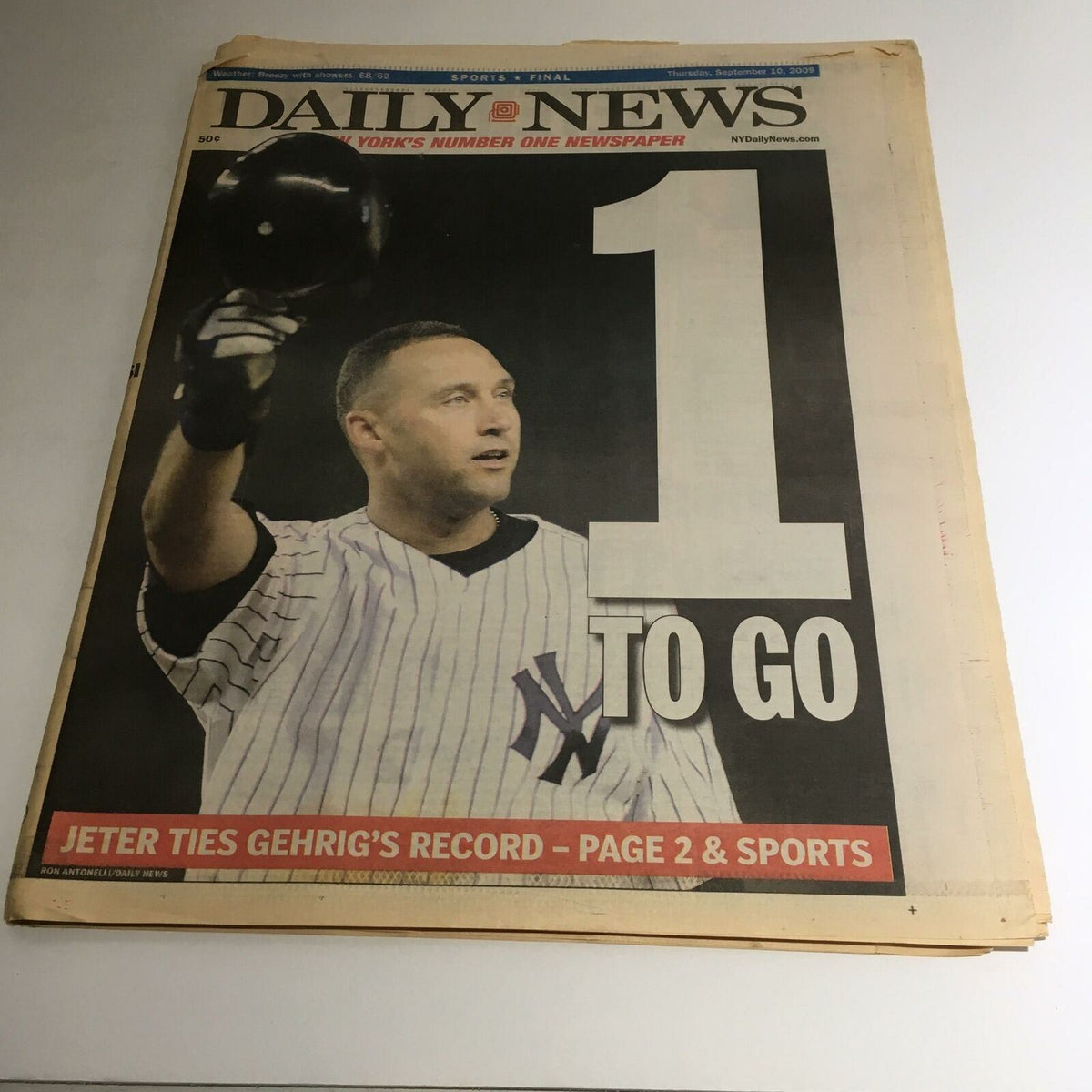 NY Daily News from September 10, 2009, featuring a headline '1 To Go' as Derek Jeter ties Lou Gehrig's record, showcasing the legendary New York Yankees player.