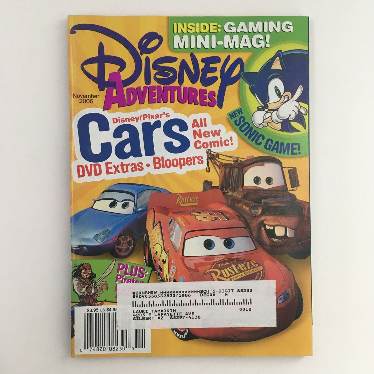 Cover of Disney Adventures Magazine from November 2006 featuring Disney Pixar's Cars and Sonic Game, showcasing vibrant colors and characters from the magazine.