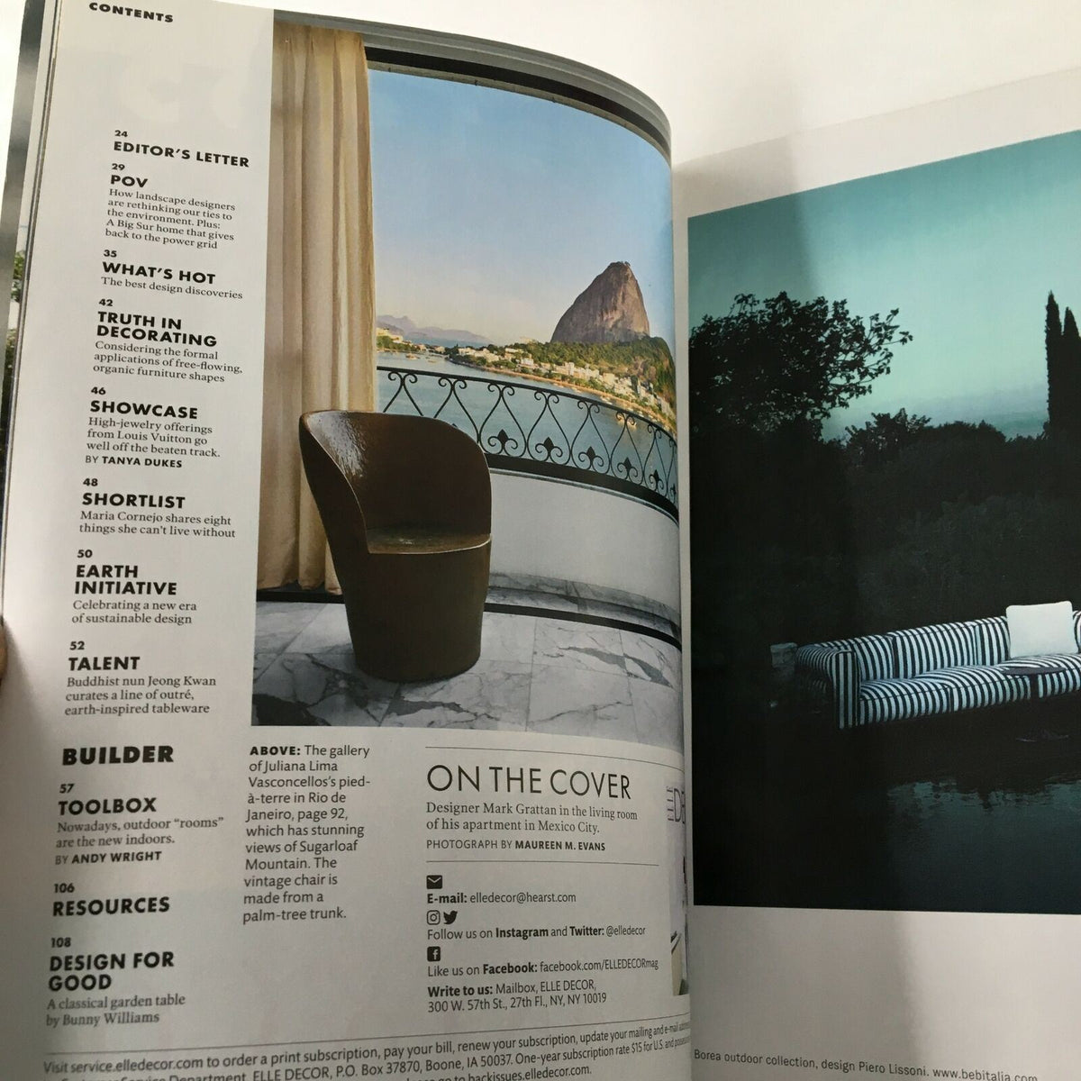 Interior design showcase from Elle Decor Magazine April 2021 displaying a scenic view along with a stylish chair, emphasizing modern decor themes and the influence of designer Mark Grattan.