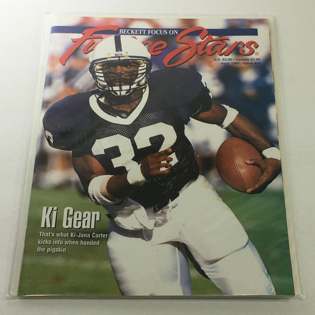 Beckett Future Stars: April 1995 Issue #48 featuring Ki-Jana Carter on the cover, showcasing sports gear with a focus on his football career.
