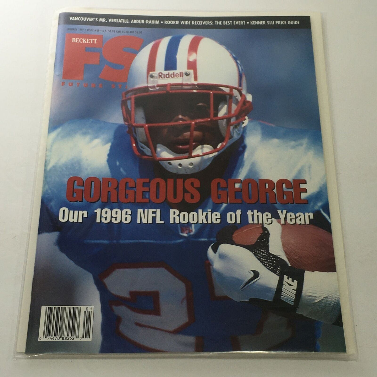 Beckett Future Stars January 1997 Issue #69 featuring Gorgeous George, the 1996 NFL Rookie of the Year, on the cover showcasing football gear and a determined expression.