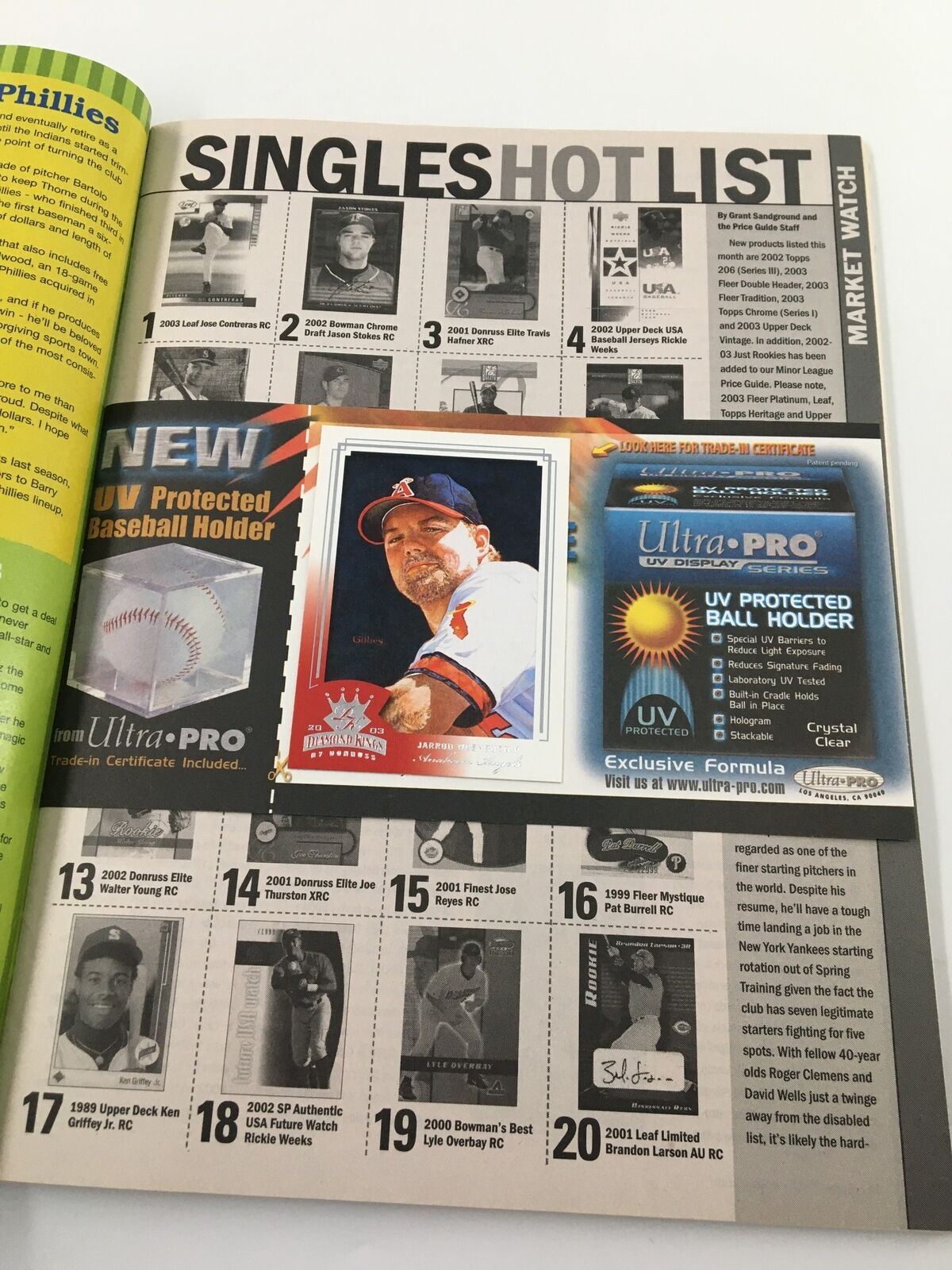 Page from Beckett Baseball Card Monthly April 2003 #217 showcasing singles hot list with a UV-protected baseball card and mention of exclusive formula.