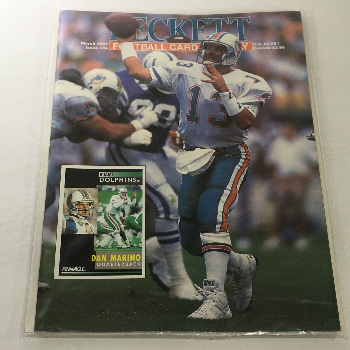 Beckett Football Card Monthly: March 1992 Issue #24 featuring Dan Marino, Miami Dolphins quarterback. The magazine cover displays Marino in action, throwing a pass, with details about the issue and card information.