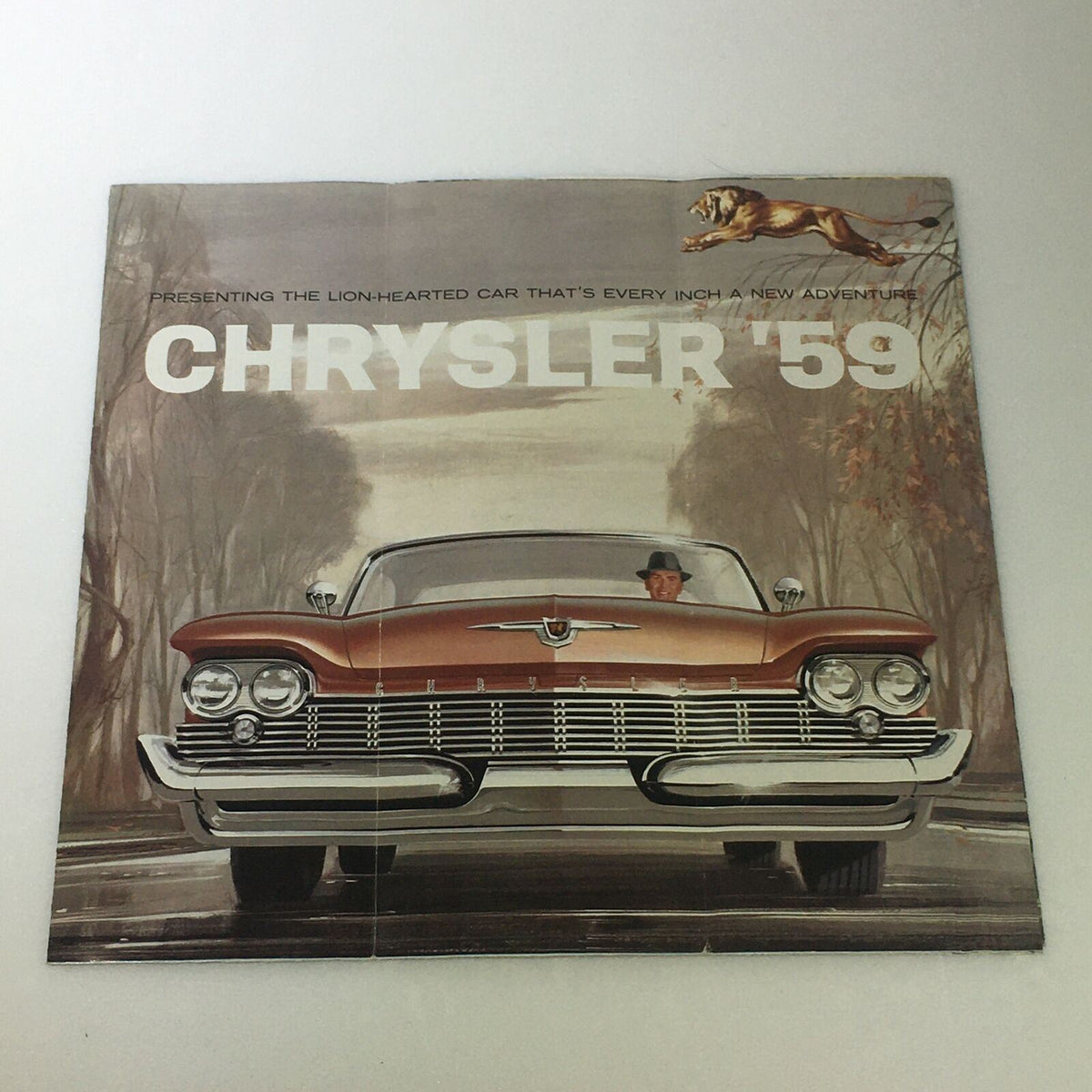 Cover of the VTG 1959 Chrysler Windsor New Yorker Sedan Hardtop Car Auto Brochure Catalog featuring an iconic illustration of the car in a scenic setting.
