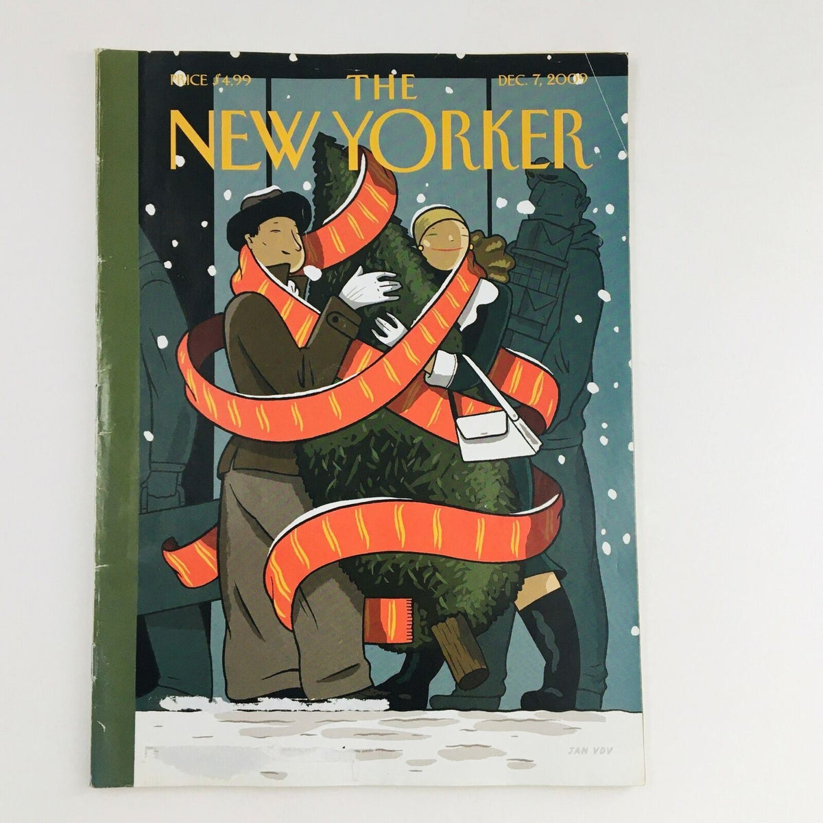 The New Yorker December 7 2009 Cover Image featuring a festive scene with characters wrapped in red scarves carrying a Christmas tree, designed by Jan Van Der Veken.