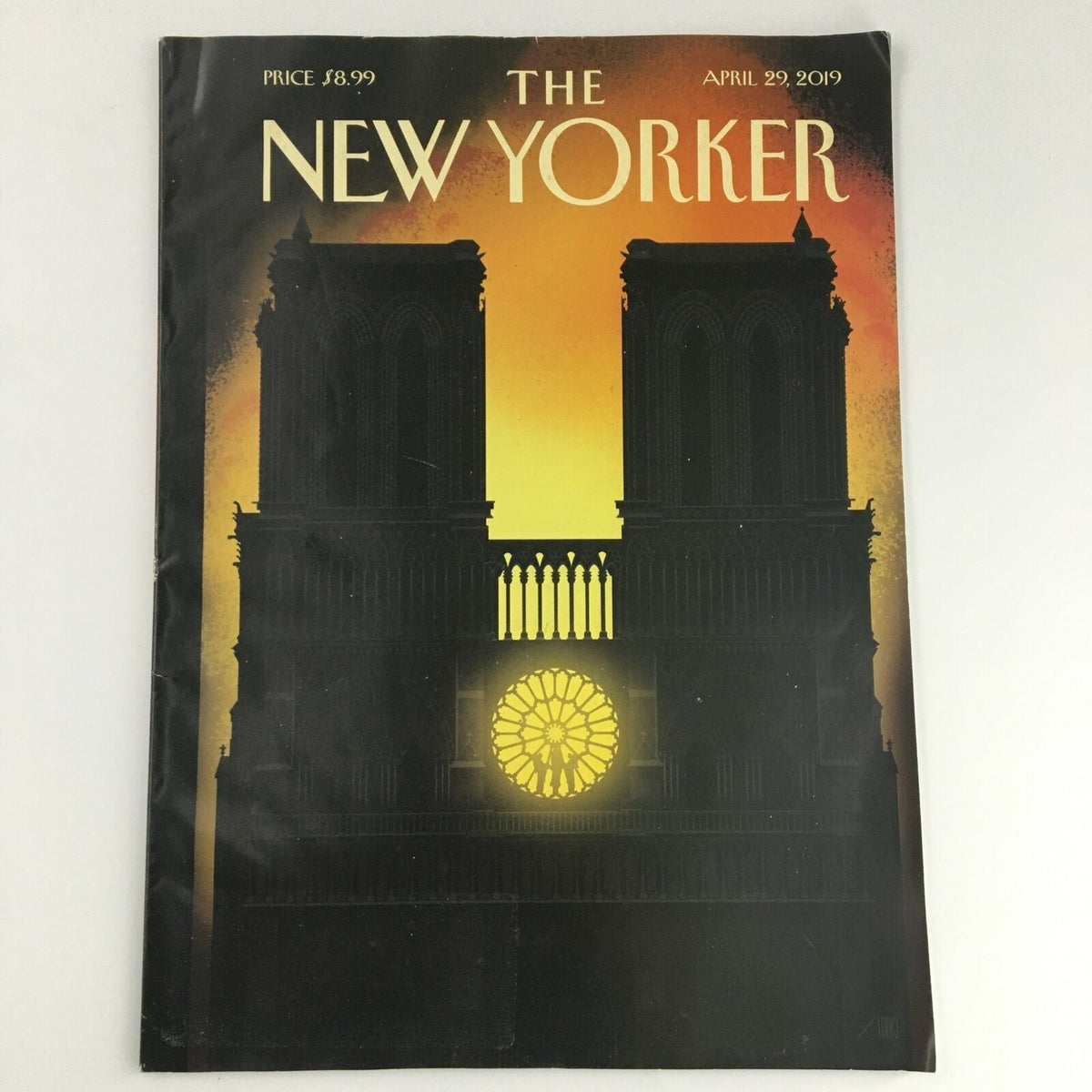 Cover of The New Yorker April 29 2019 magazine featuring artwork by Bob Staake, depicting a silhouetted architectural scene with a glowing rose window.