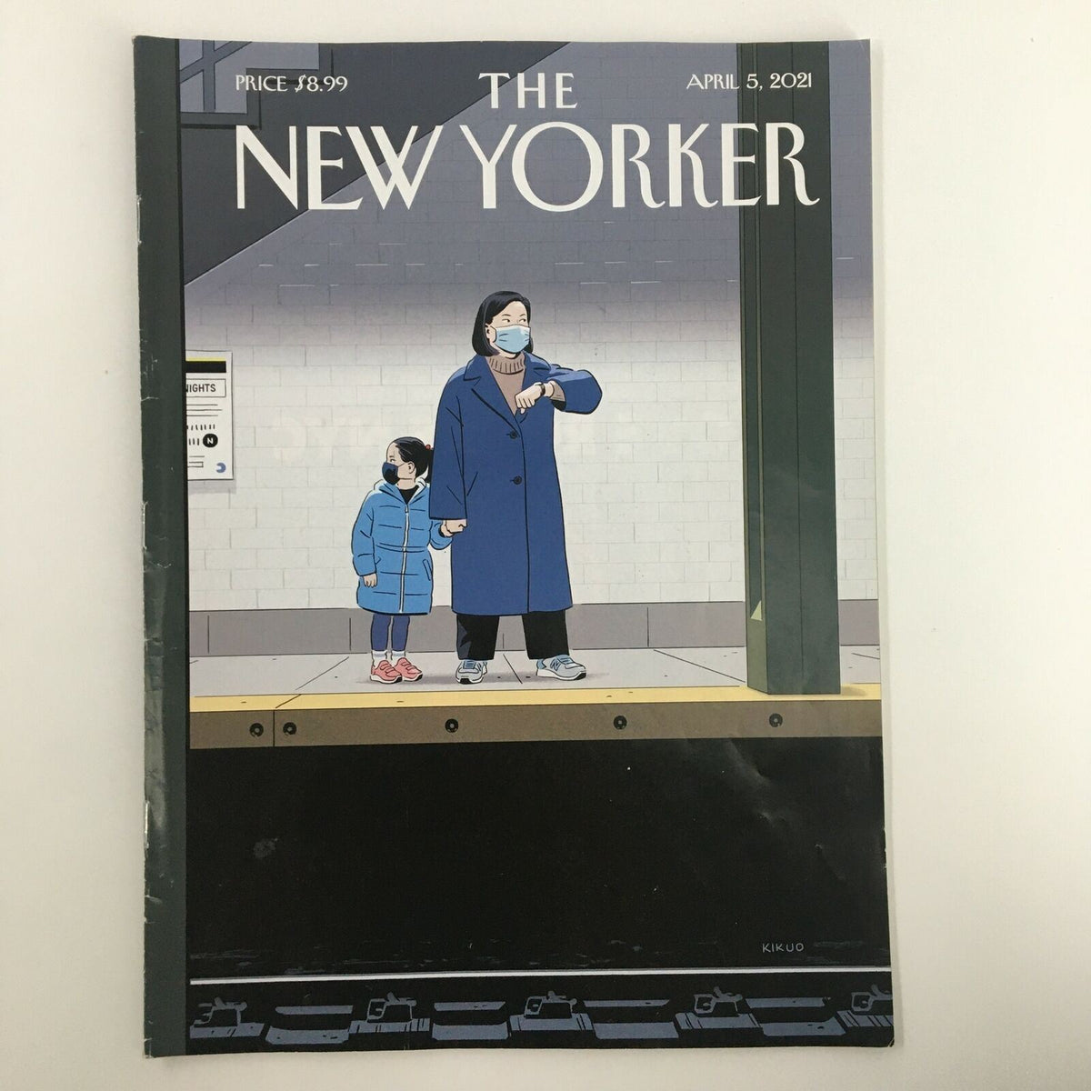 The New Yorker Full Magazine April 5, 2021 cover featuring cover art titled 'Delayed' by R. Kikuo Johnson, depicting a woman and child wearing masks at a subway station.