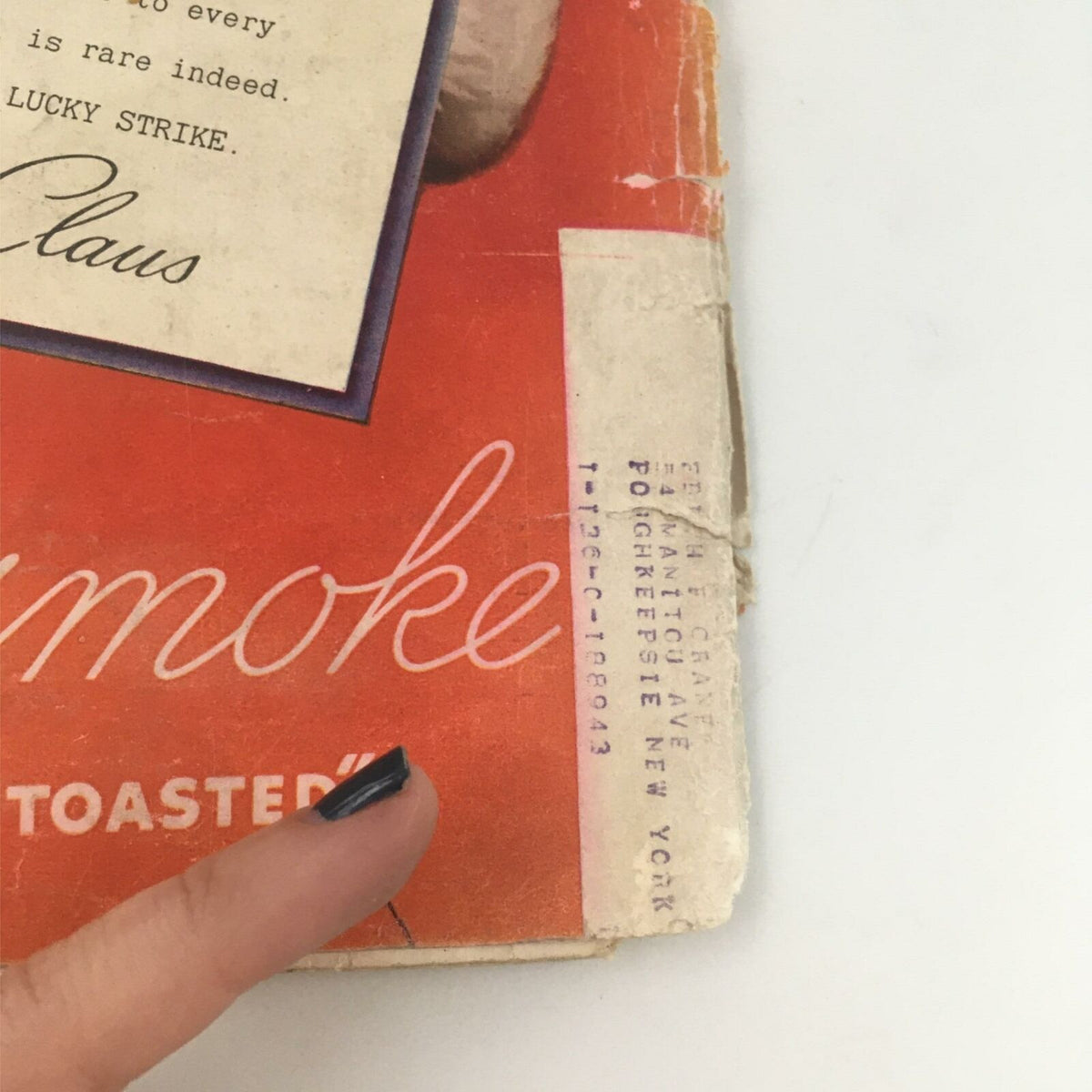 Vintage Life Magazine December 21, 1936 cover detail showing wear, including a corner rip and an address label. Perfect for collectors interested in historical memorabilia.