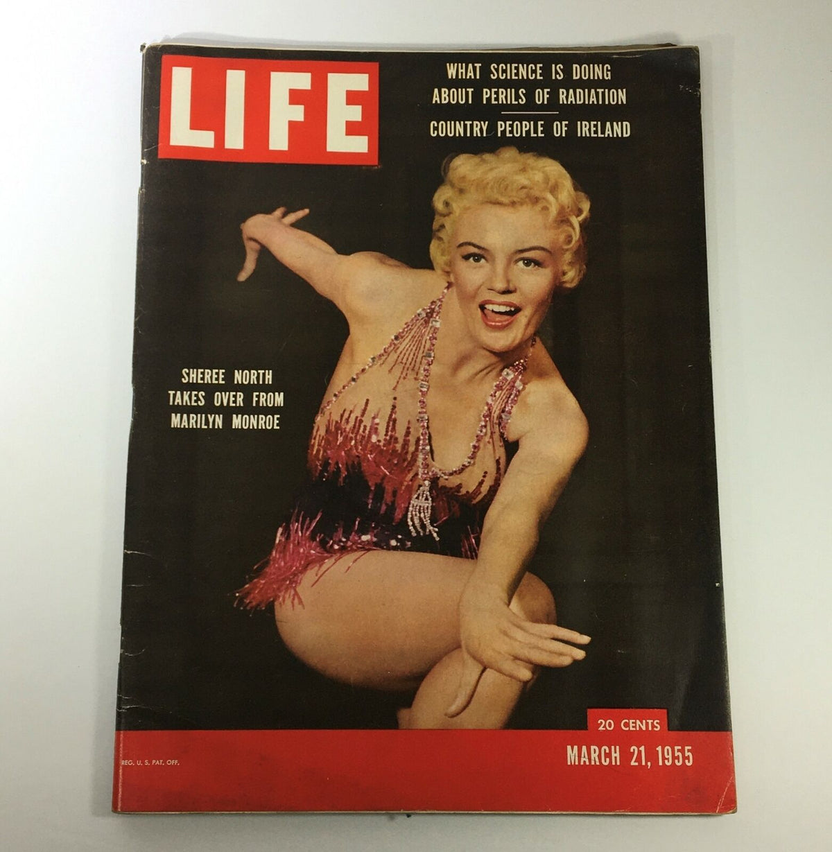 Vintage Life Magazine from March 21, 1955, featuring actress Sheree North on the cover, showcasing mid-century Hollywood glamour.