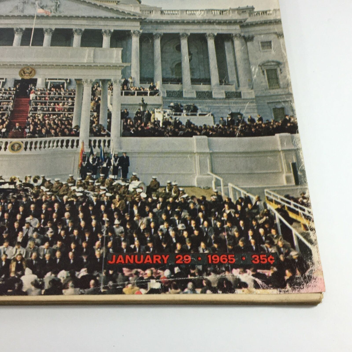 Detailed image of the lower section of the cover of VTG Life Magazine January 29 1965, displaying the date and crowd gathered for the Inaugural Spectacle.