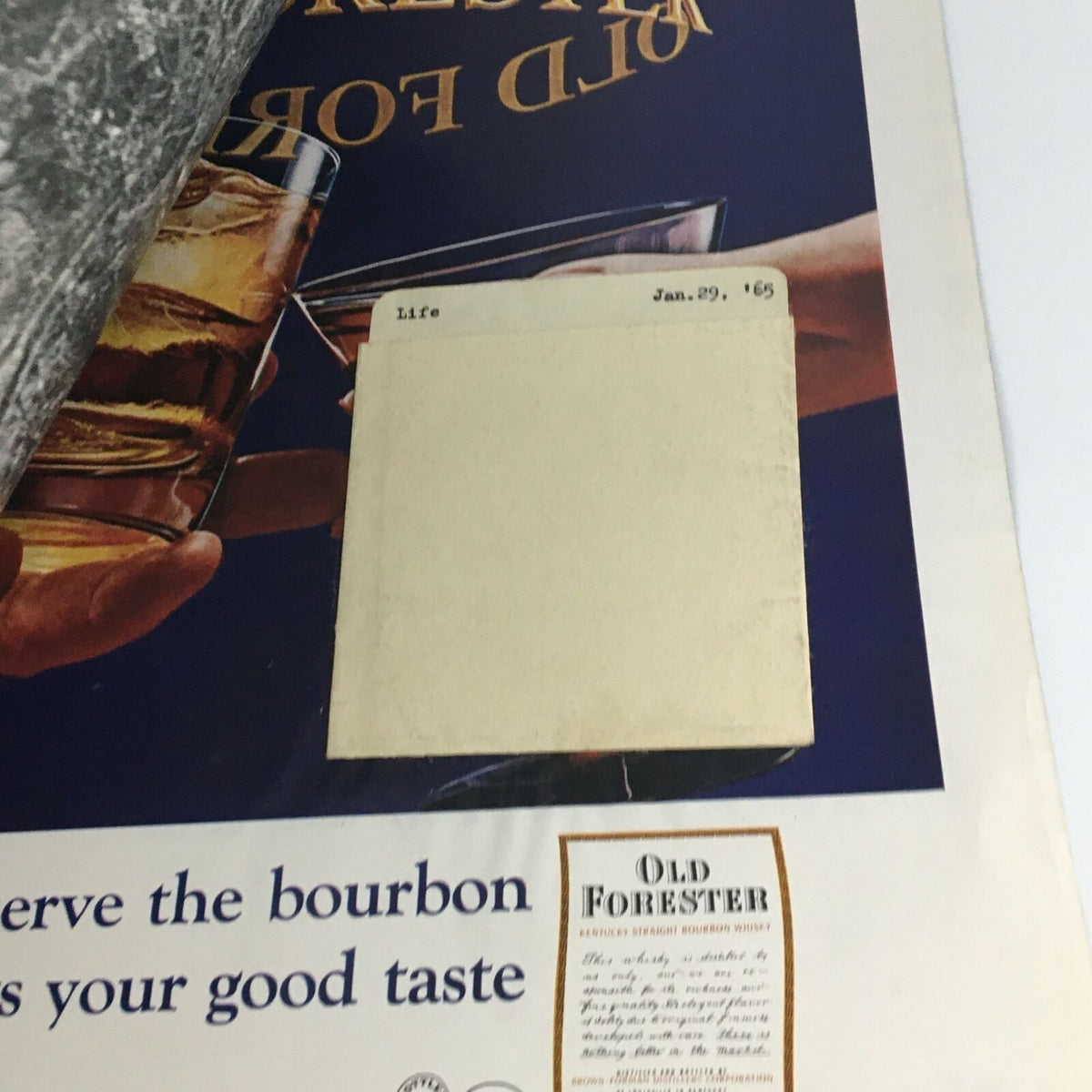 Inside back cover of VTG Life Magazine January 29 1965 featuring an ad for Old Forester with a library card holder.
