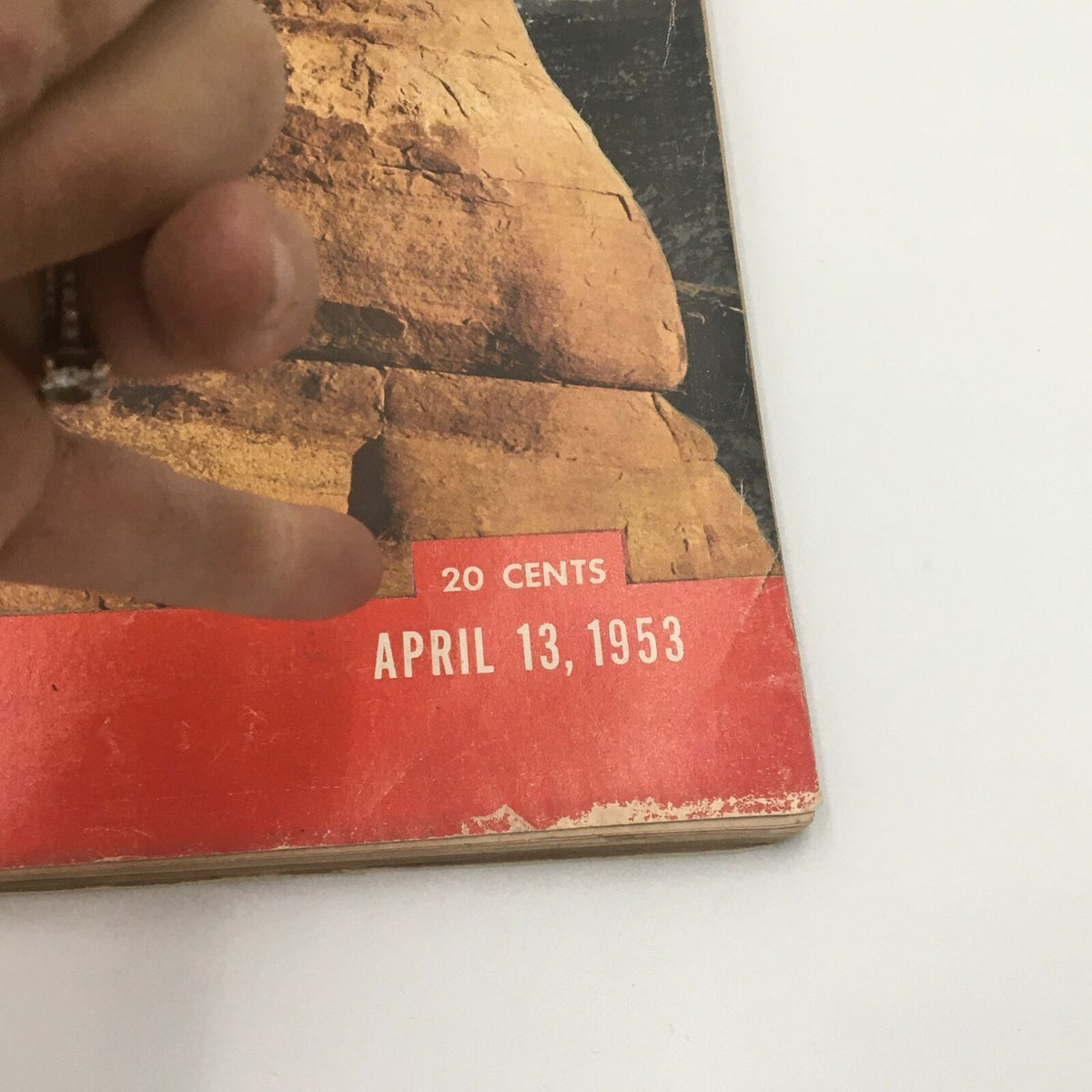 Close-up view of the bottom corner of VTG Life Magazine dated April 13 1953, showing the date and price.