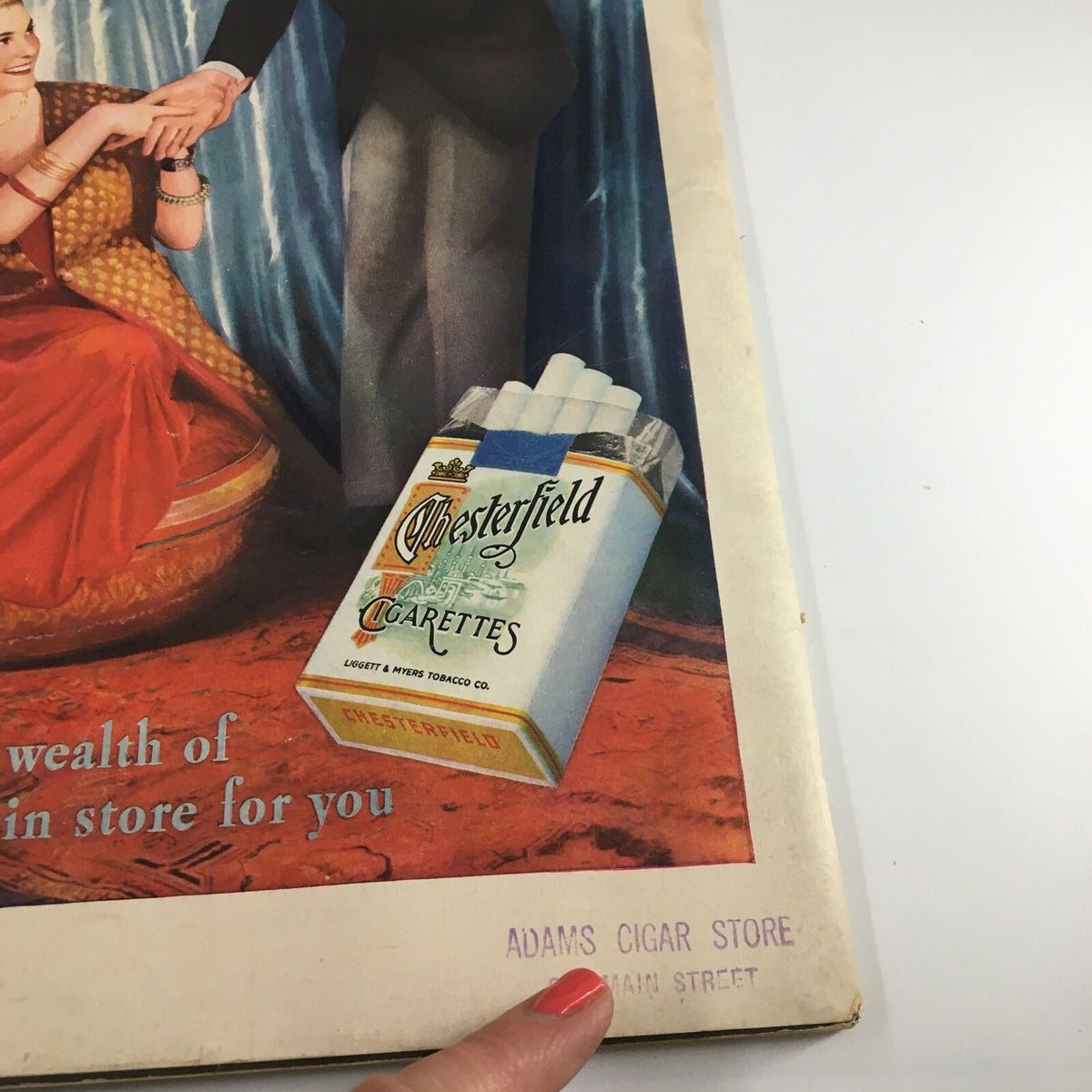 Back cover of VTG Life MagazineJune 14, 1937 with an advertisement for Chesterfield cigarettes and a stamp from Adams Cigar Store.