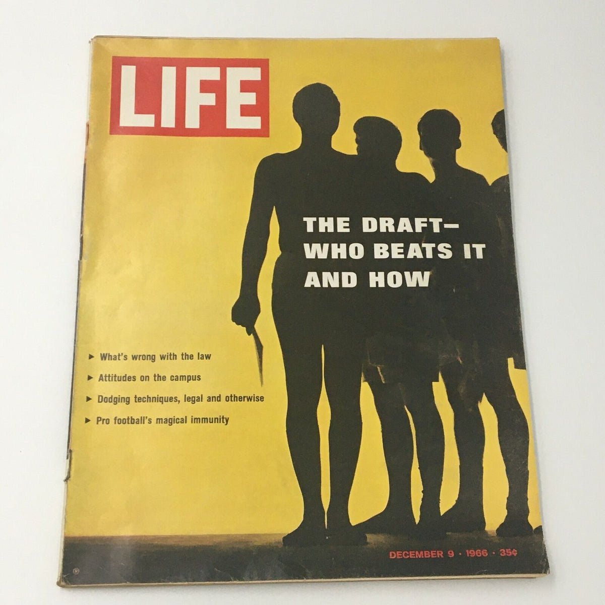 Cover of VTG Life Magazine from December 9, 1966 featuring a silhouette of figures with the headline 'THE DRAFT—WHO BEATS IT AND HOW'. The magazine includes topics on legal issues, college attitudes, and 'Pro football's magical immunity'.